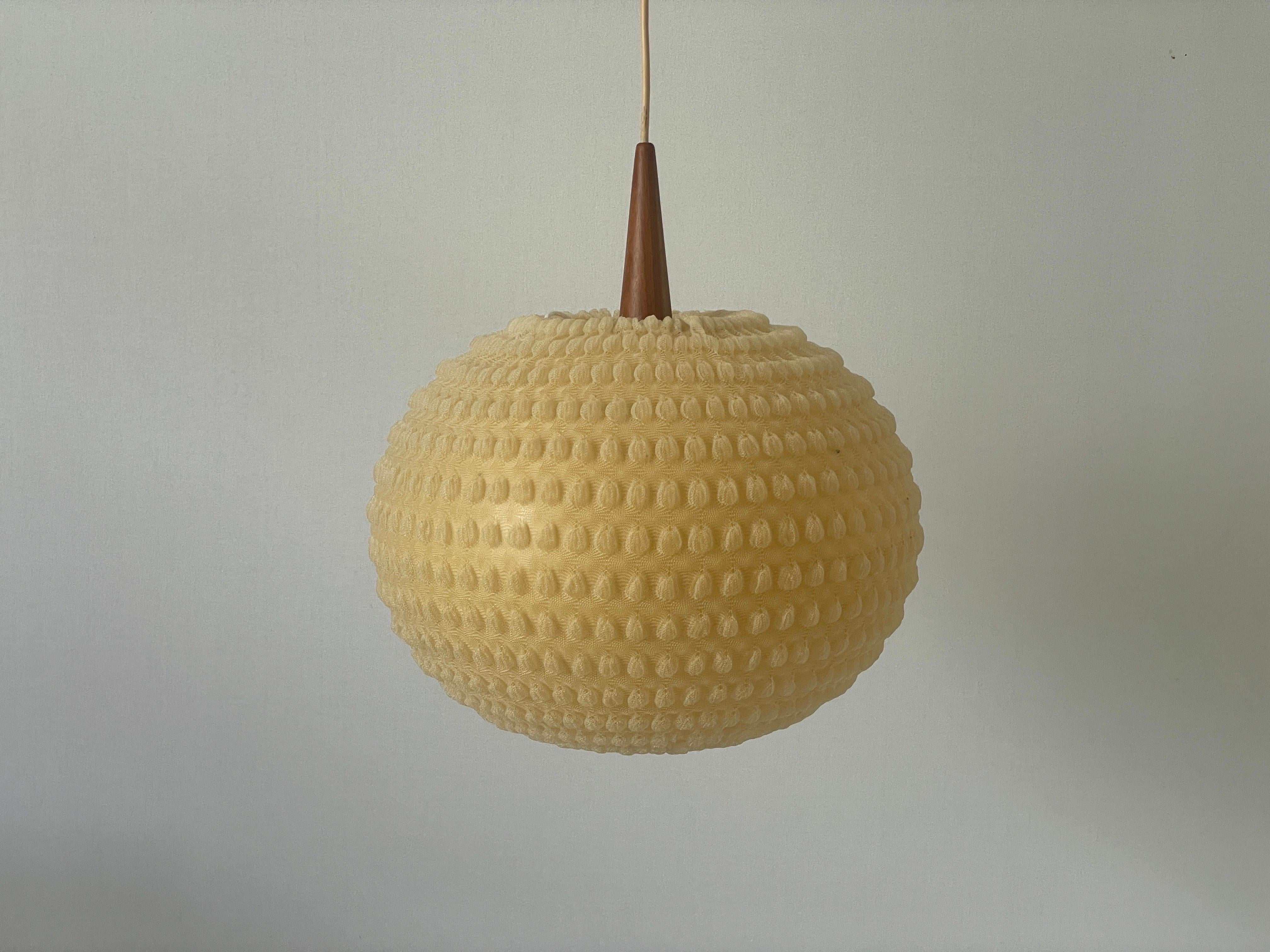 Teak & Ball Fabric Shade Ceiling Lamp by Temde, 1960s, Germany

Elegant and minimal design hanging lamp

Lampshade is in good condition and very clean. 
This lamp works with E27 light bulb. 
Wired and suitable to use with 220V and 110V for all