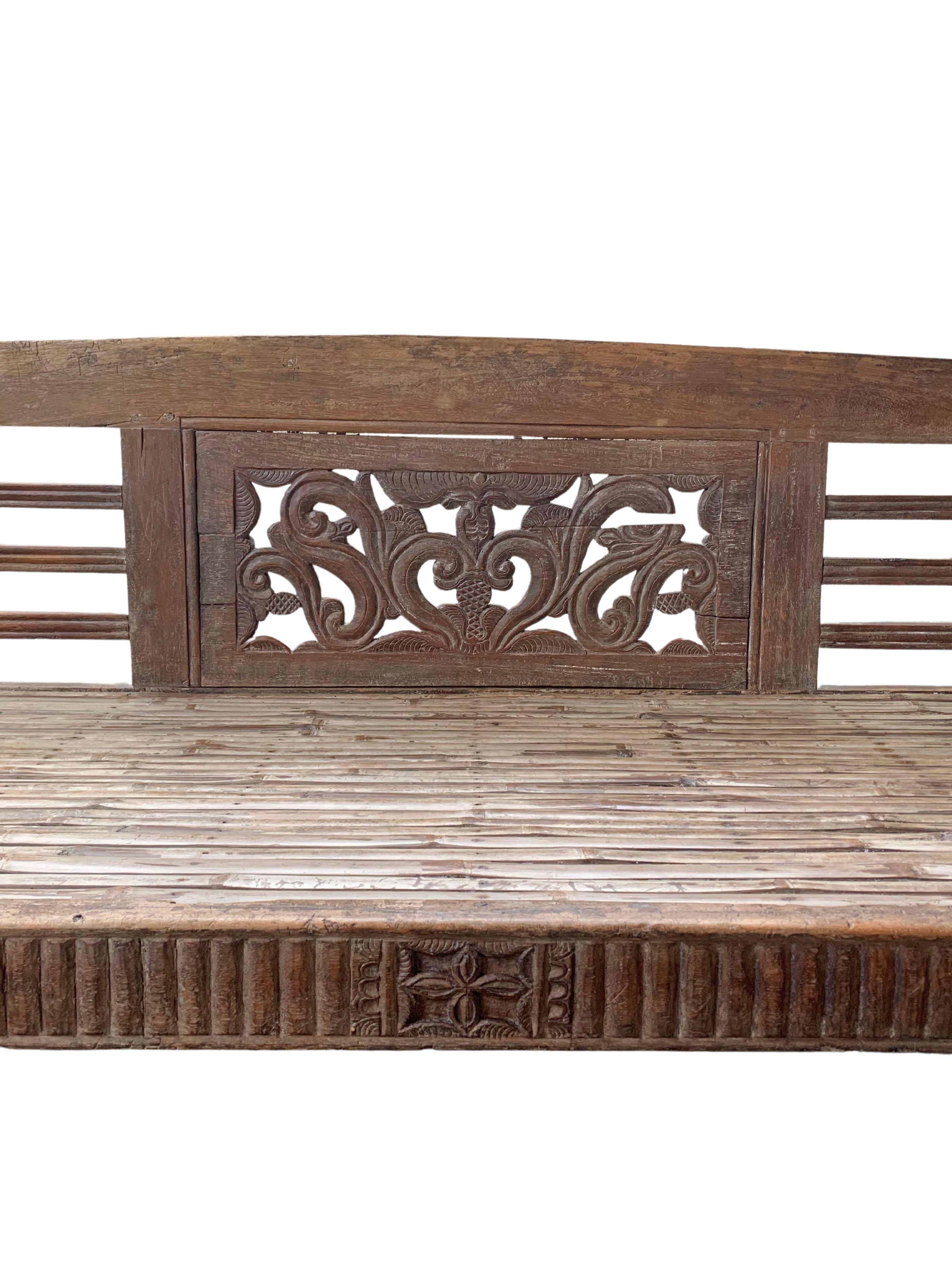 Indonesian Teak & Bamboo Bench with Carved Detailing Madura Island, Java, Indonesia c. 1950 For Sale
