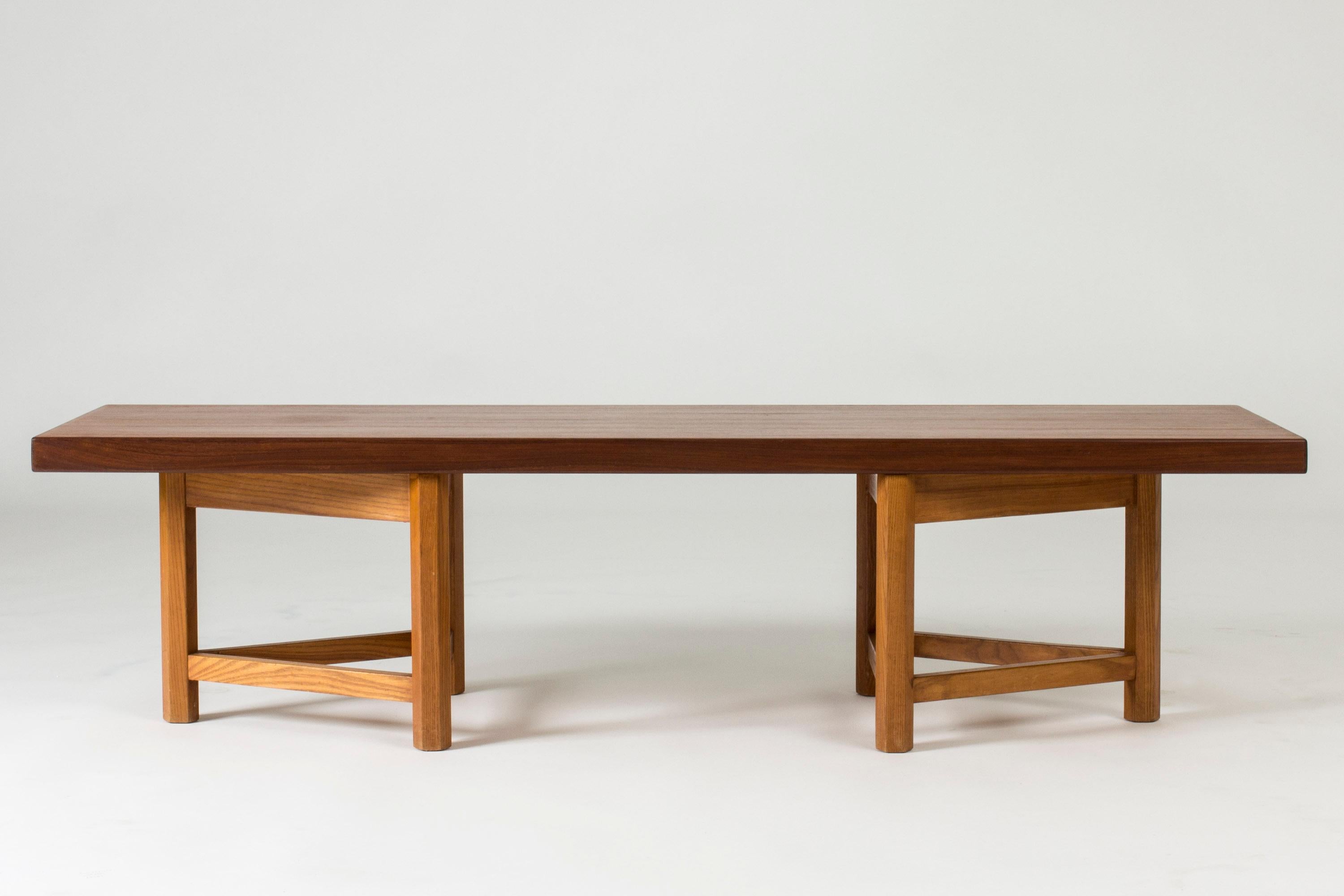 Teak bench with loose tripod legs in a lighter color wood by Gustaf Hiort af Ornäs. Works well as a sideboard or room divider. Clean, simplistic lines and great quality.