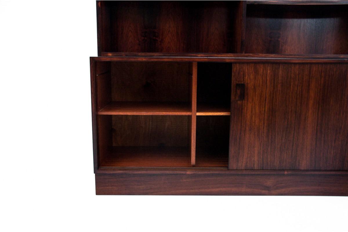 The 1960s shelf was imported from Denmark.

The upper part of the furniture has a lot of open shelves. The lower part has shelves, closed with sliding doors. The furniture is great for storing books and various decorations.

Minimalist, timeless