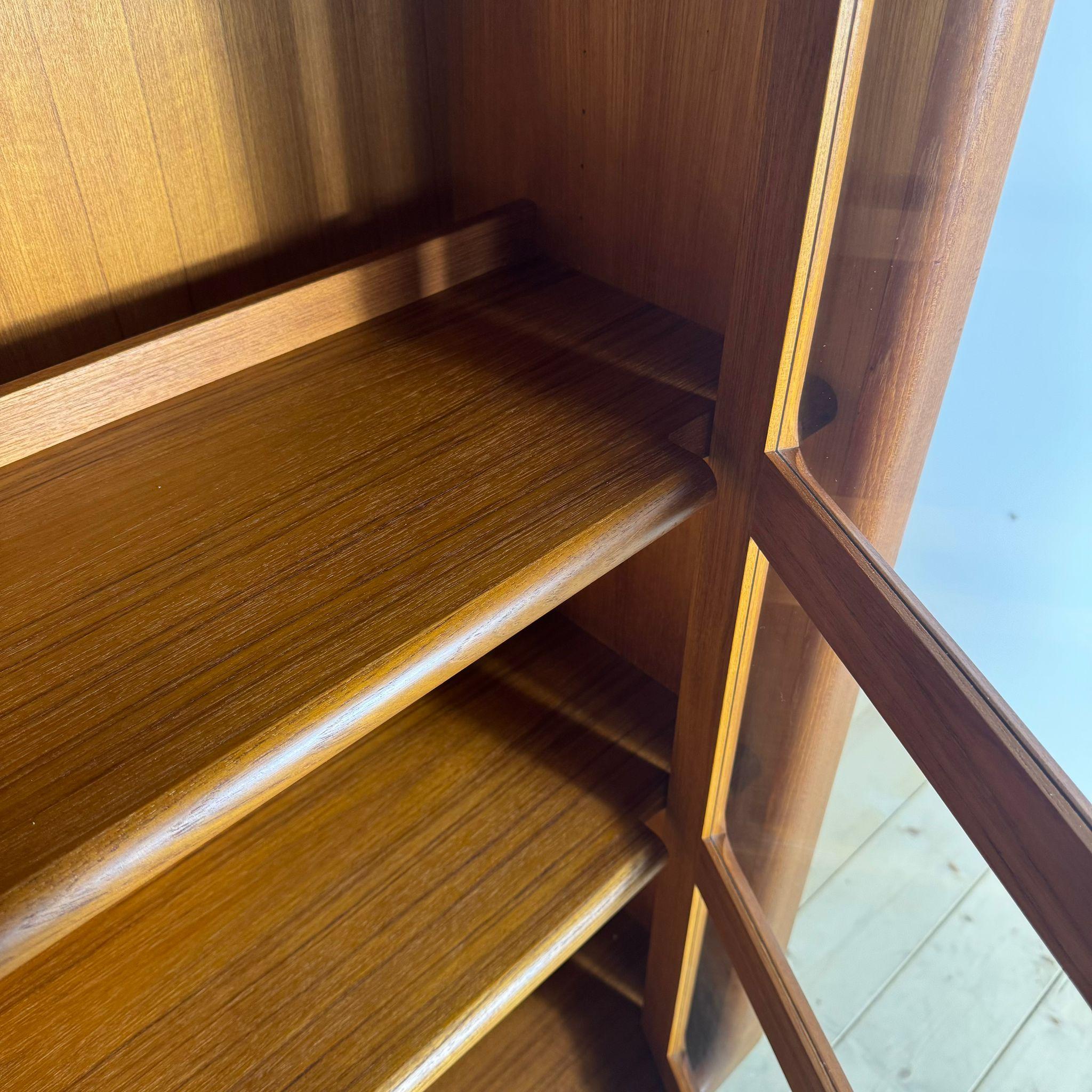 Teak bookcase with glass doors, Denmark 1960s For Sale 1
