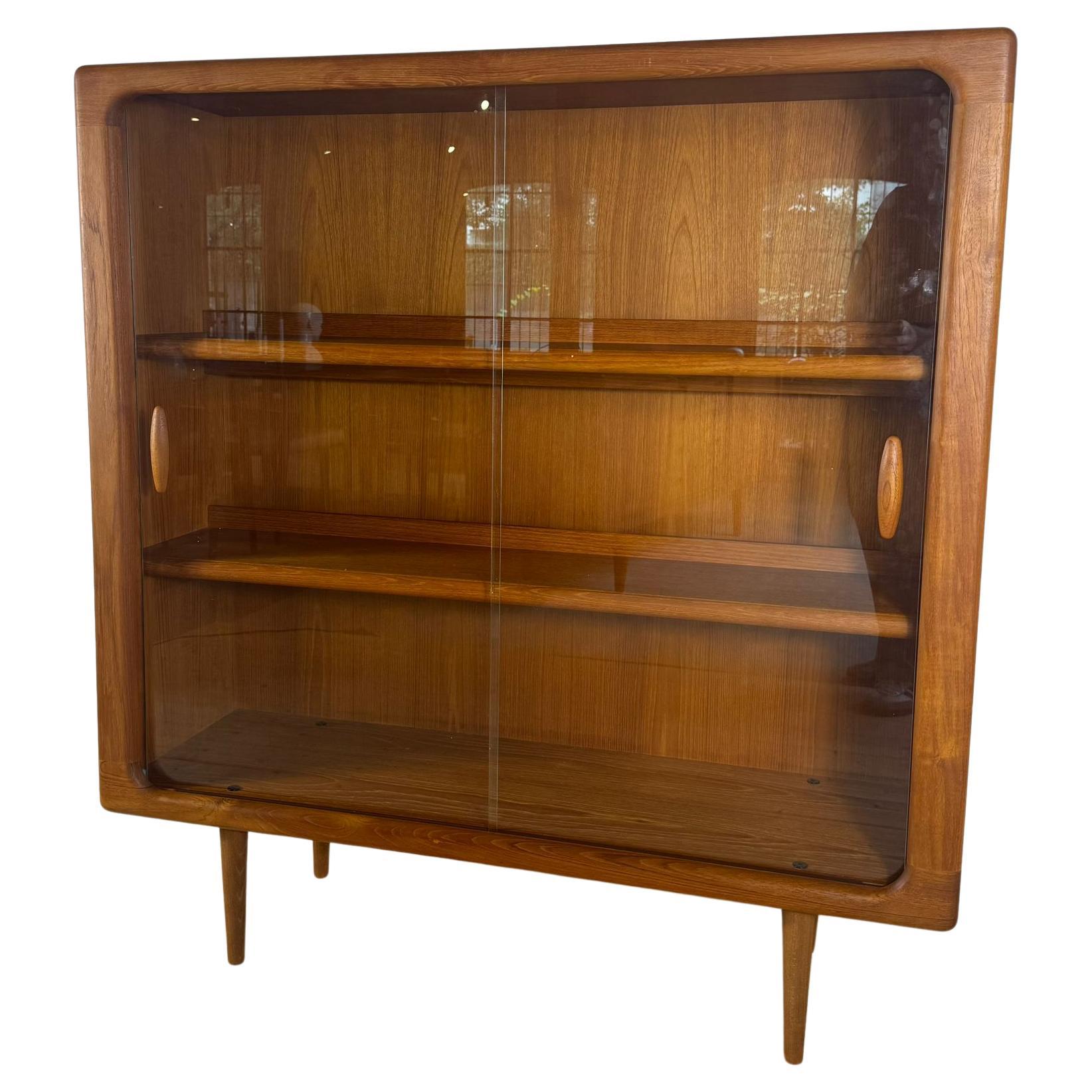 Teak bookcase with glass doors, Denmark 1960s For Sale