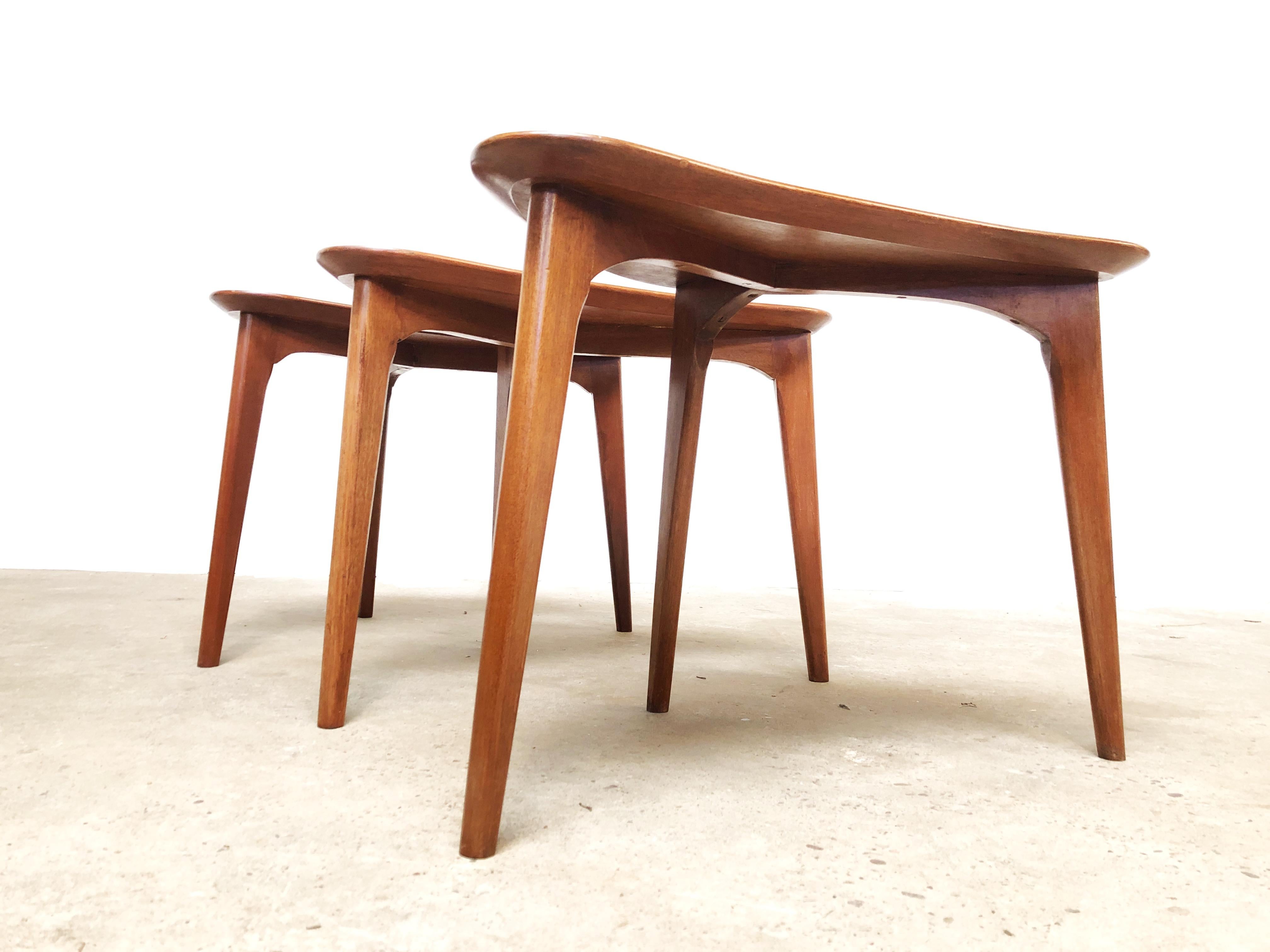 Teak boomerang offee tables. 

3 x coffee / occasional tables from the midcentury. Price for a set of 3.

Danish. Made with teak. Boomerang / kidney design.