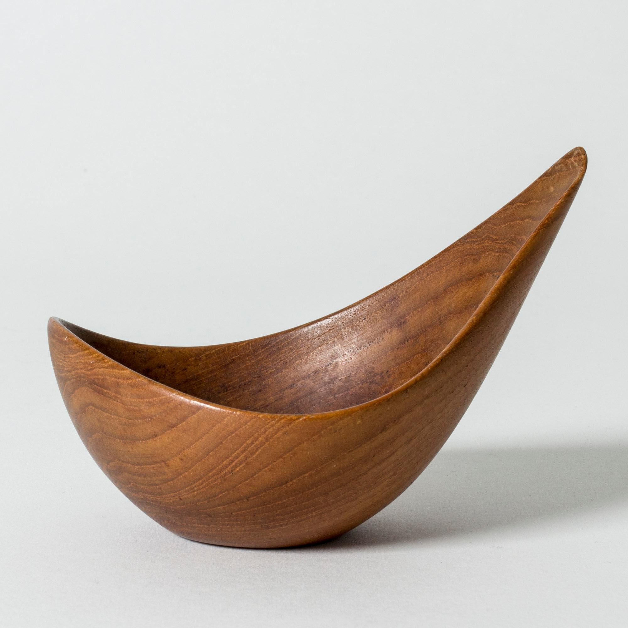Lovely bowl by Johnny Mattsson, sculpted from teak in a drop-like design. Playful, sculptural form.
