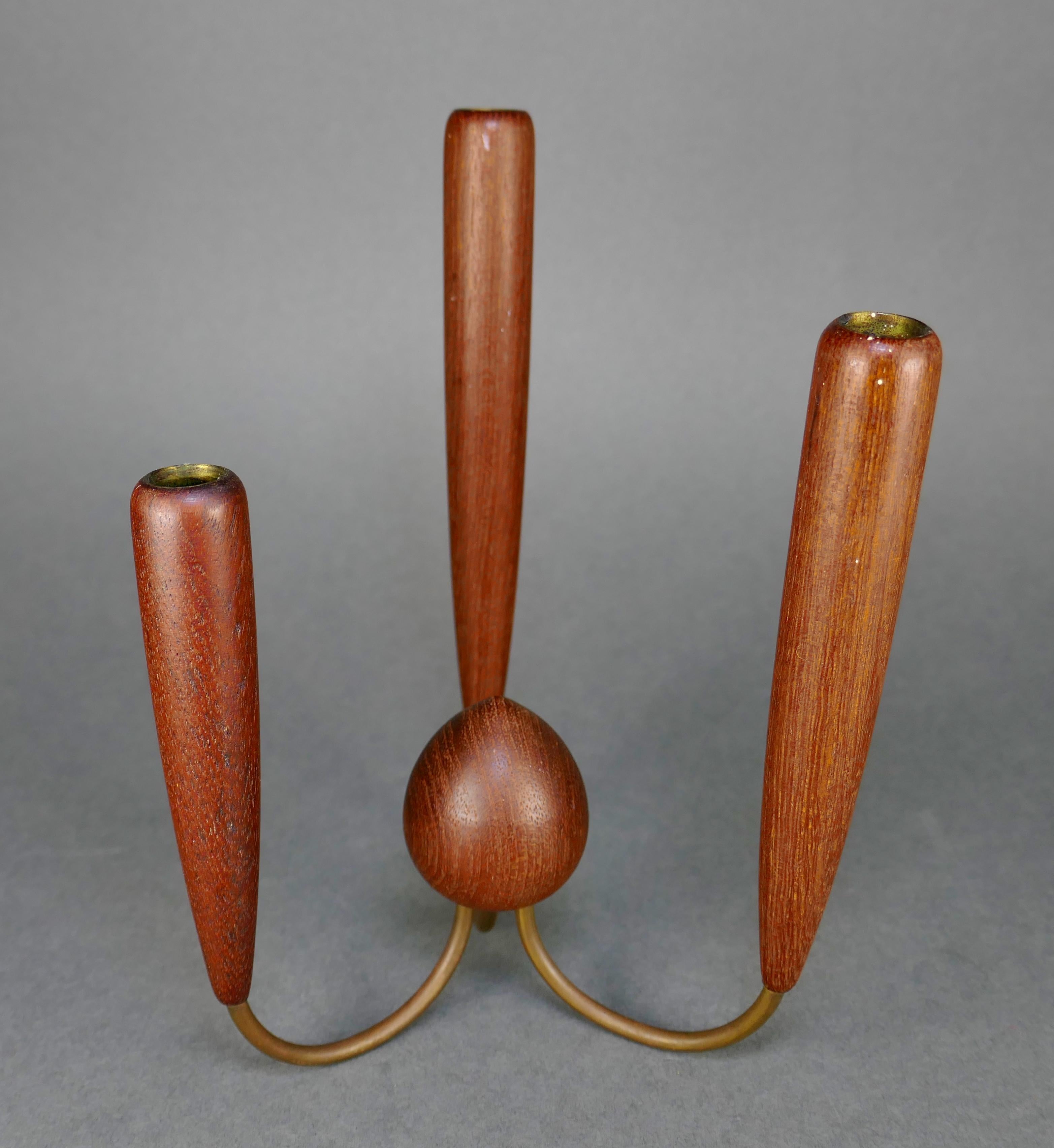 Unique solid teak and brass three-tiered candelabra from Denmark. Hold candles 1/2