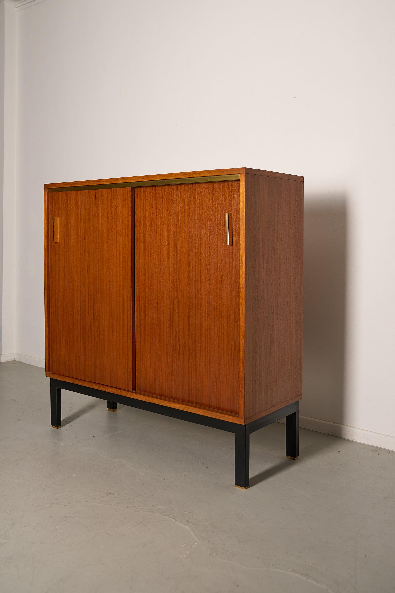 Mid-Century Modern Teak cabinet with brass details & black metal base, 1970s For Sale