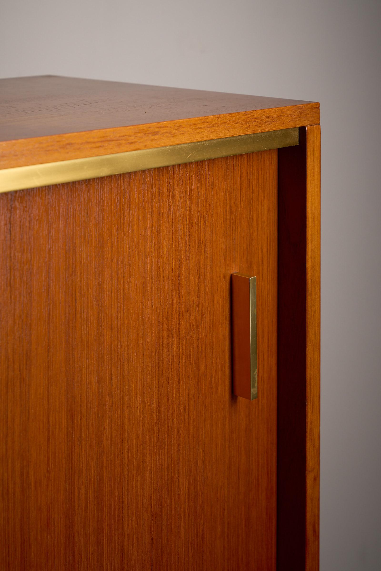 Teak cabinet with brass details & black metal base, 1970s For Sale 1