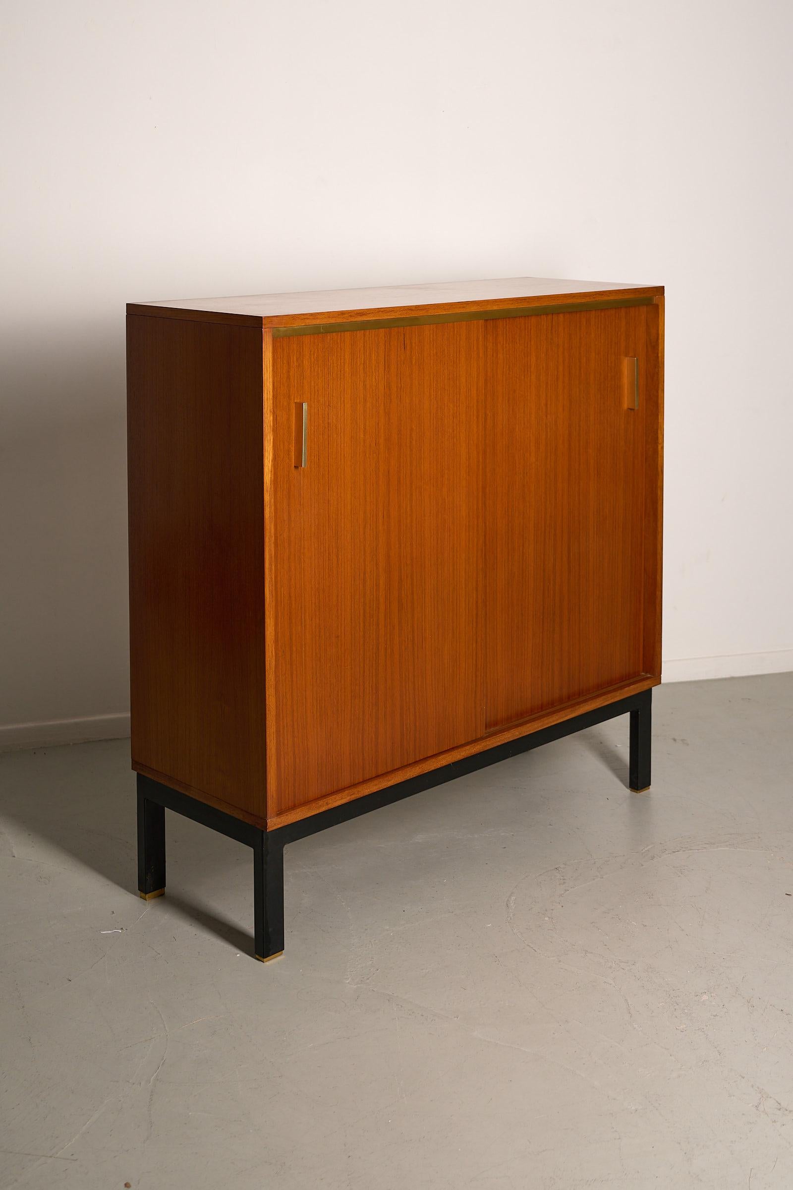 Teak cabinet with brass details & black metal base, 1970s For Sale 2