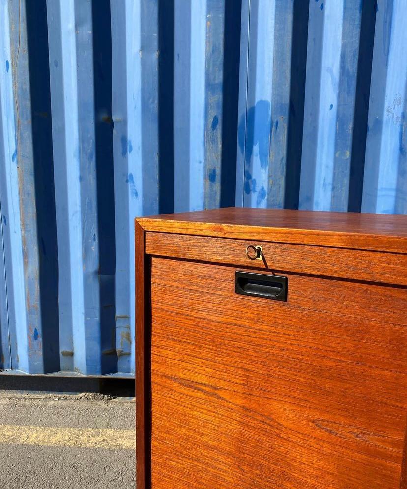 Mid-20th Century Teak Cabinet with Vertical Silidind Doors by Bjerringbro Savværk, 1960s, Denmark For Sale