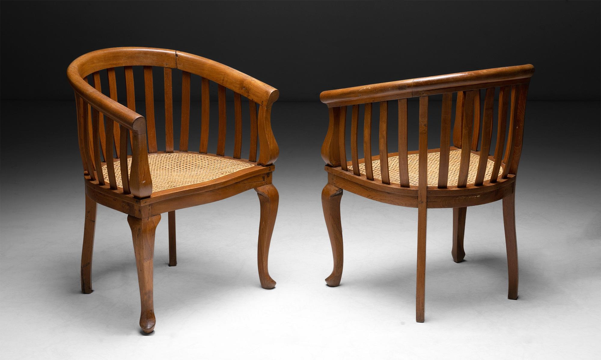 Teak & Cane Armchairs, Indonesia circa 1960 In Good Condition In Culver City, CA