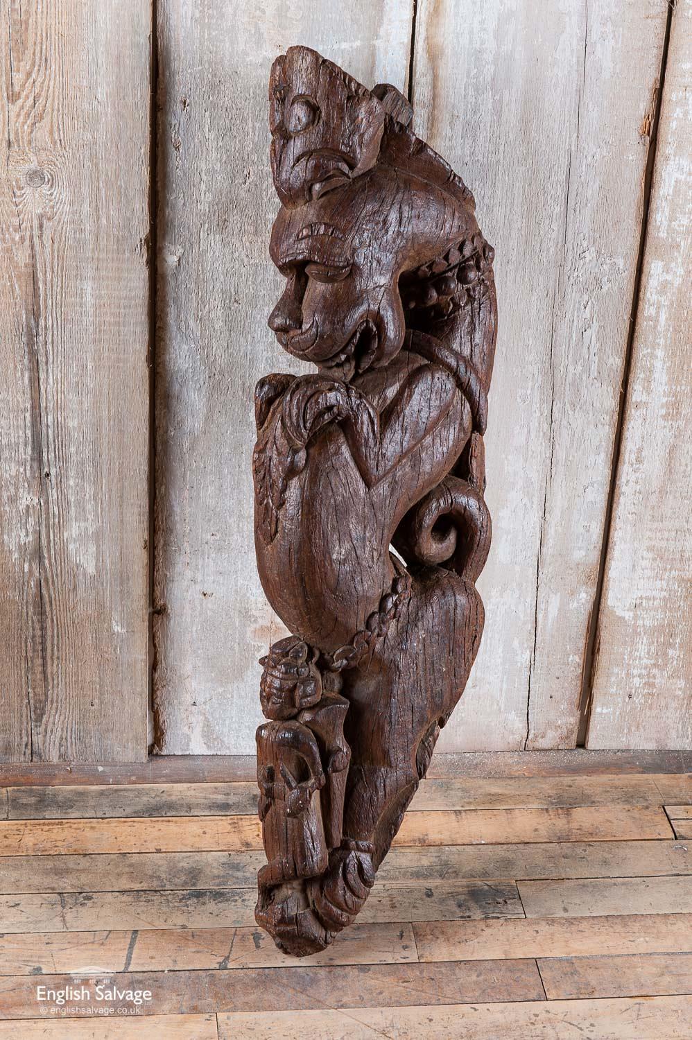 Unusual and impressive corbel or bracket in the form of a lion, hand carved from reclaimed teak. This could be a representation of Narasimha, an avatar of the Hindu God, Vishnu, which took the form of part-lion and part-man to destroy evil and