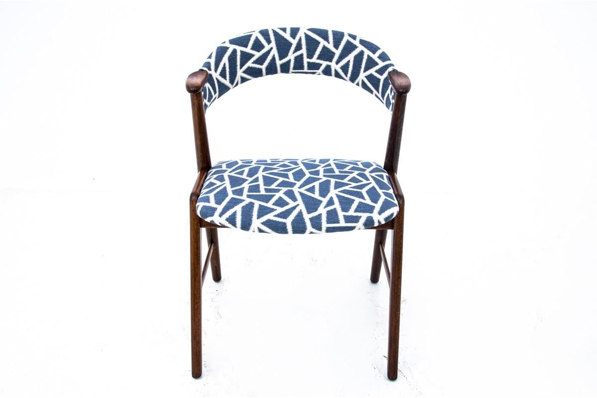 Teak chair produced in Denmark in the 1960s. After wood renovation and replacement of the upholstery with a new blue one with geometric patterns. Unique design.

Measures: Height 76cm, width 54cm, depth 52cm, seat height 45cm.