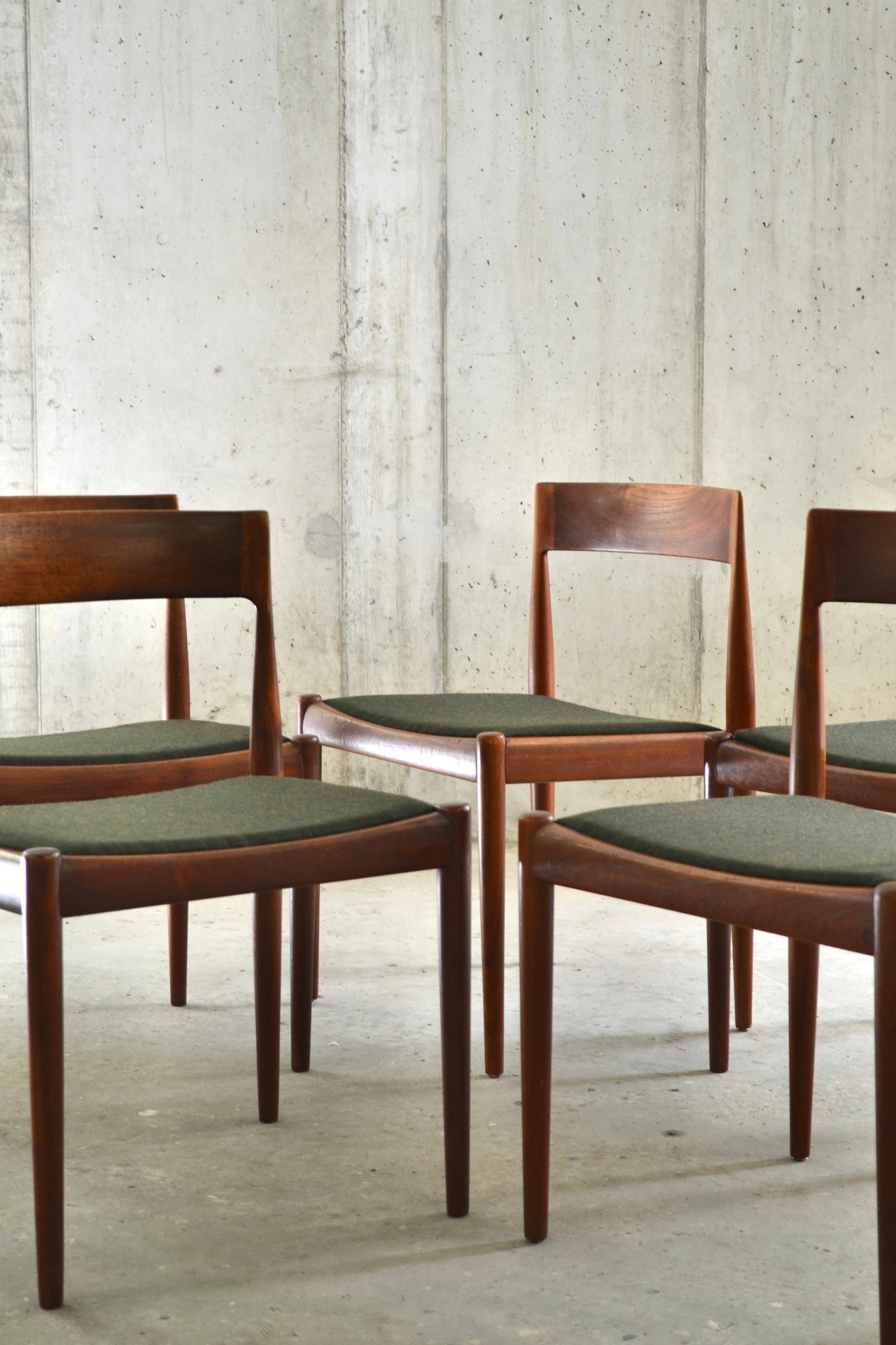 These teak chairs designed by the Danish cabinetmaker Kai Kristiansen (born in 1929) are extremely fine. They perfectly exemplify the Scandinavian design philosophy of the mid-century by embodying simplicity and elegance without the need to go