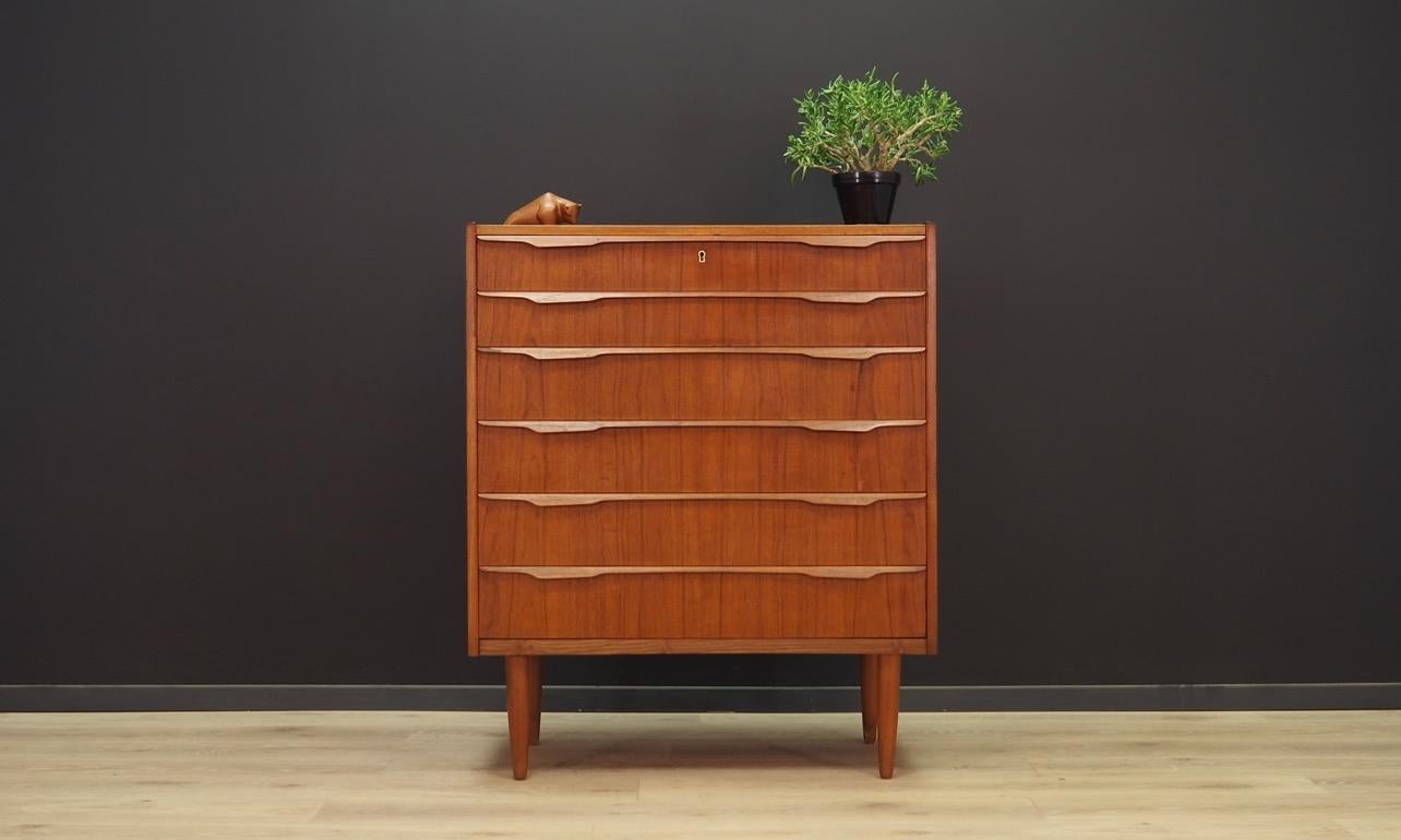 Classic chest of drawers from the 1960s-1970s, Minimalist form, Scandinavian design. The surface of the furniture is finished with teak veneer. Furniture has six drawers, no key in the set. Maintained in good condition (minor bruises and scratches,