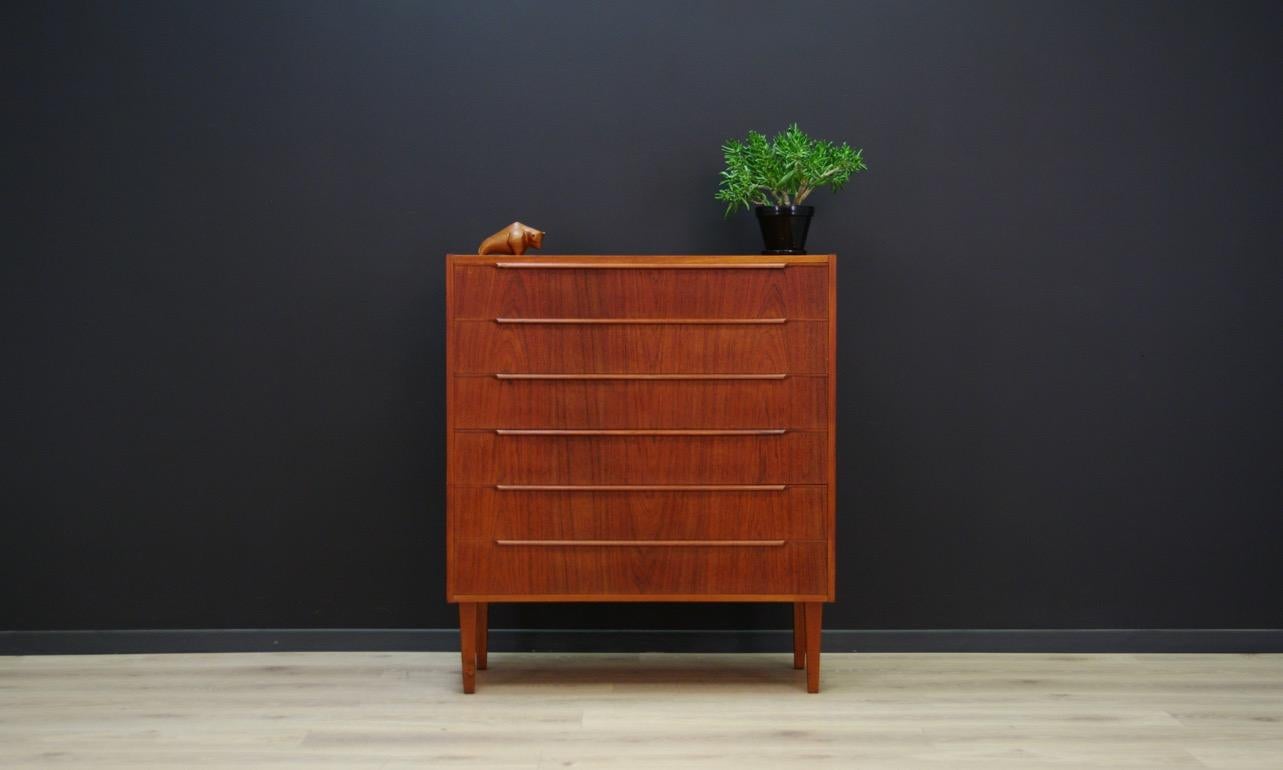 A classic chest of drawers from the 1960s-1970s, Danish design. The whole veneered with teak. The furniture has six capacious drawers. Preserved in good condition (small bruises and scratches) - directly for use. 

Dimensions: height 102.5 cm,