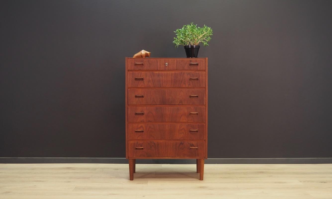 Classic chest of drawers from the 1960s-1970s, minimalistic form. The surface of the furniture is covered with teak veneer. The chest has six packing drawers. Key included in the set. Maintained in good condition (minor bruises and scratches) -