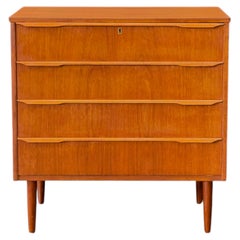 Comodino in teak con quattro cassetti