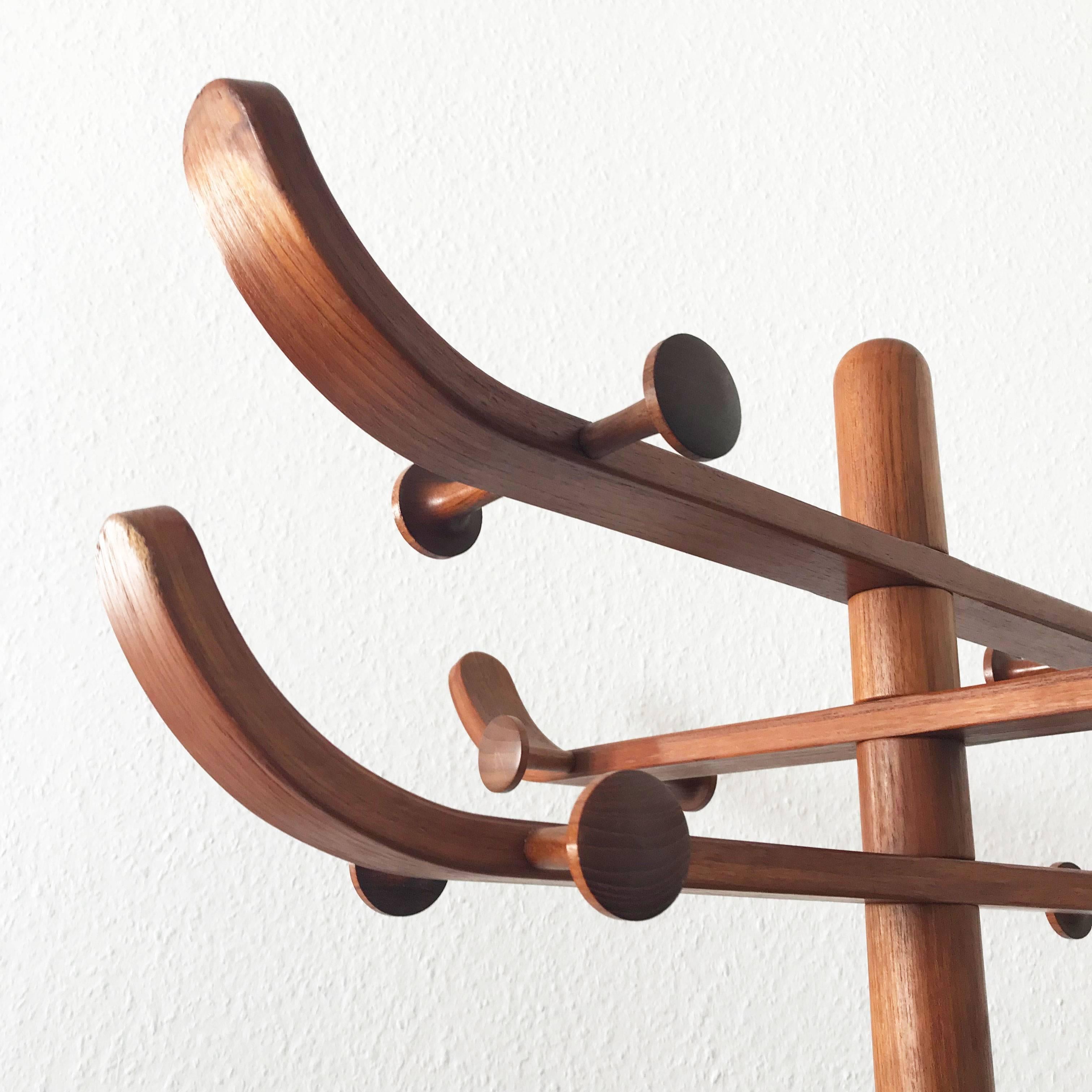 Danish coat rack with three rotating arms and 16 hooks in teak wood. Designed by Søren Nissen & Ebbe Gehl for by Aksel Kjersgaard, Denmark, 1960s