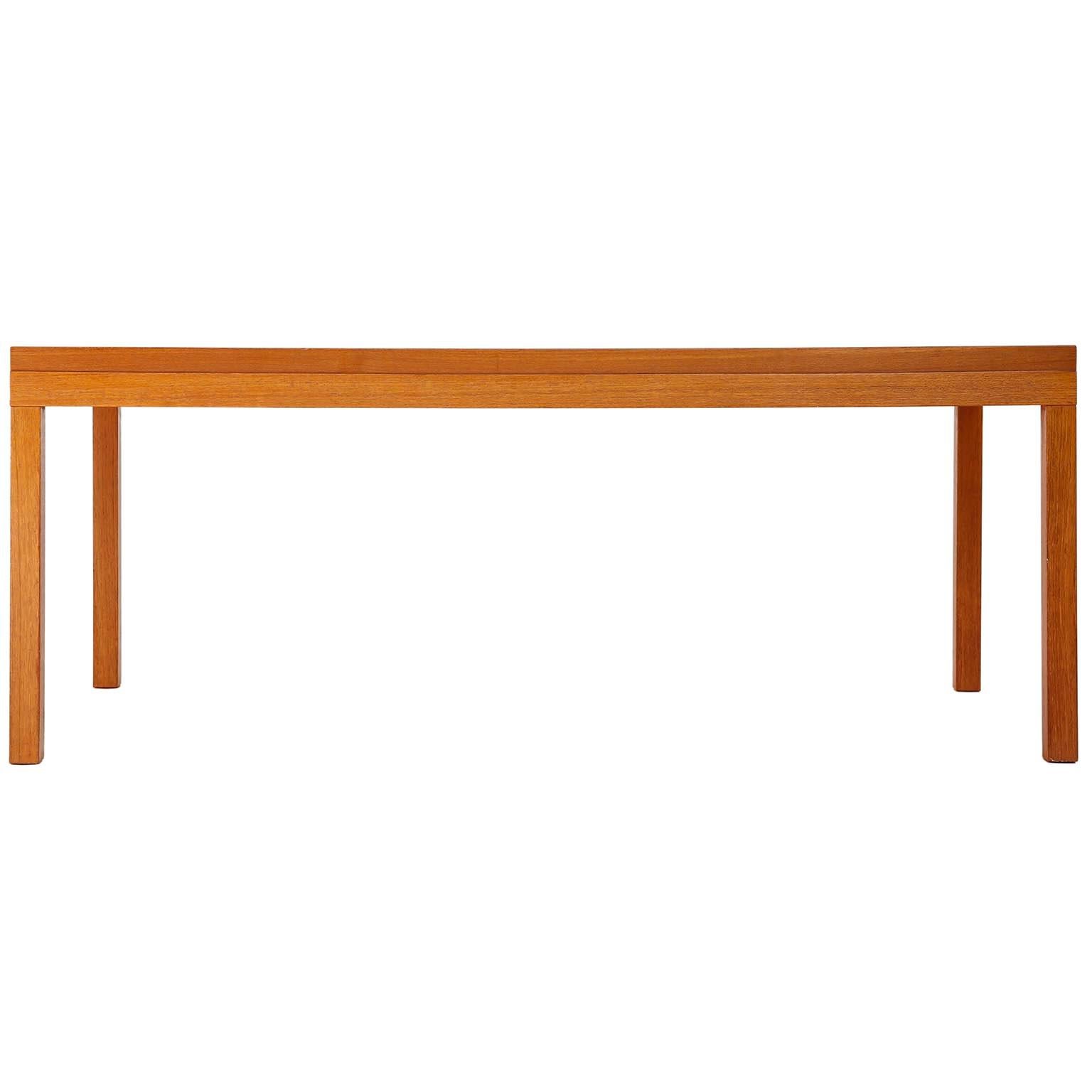 A rare rectangle coffee table in a warm toned teak wood designed by Johannes Spalt for Karl Wittmann, Austria, manufactured in midcentury, circa 1960 (late 1960s or early 1970s).
A simple and timeless design with clear lines. This table is part of