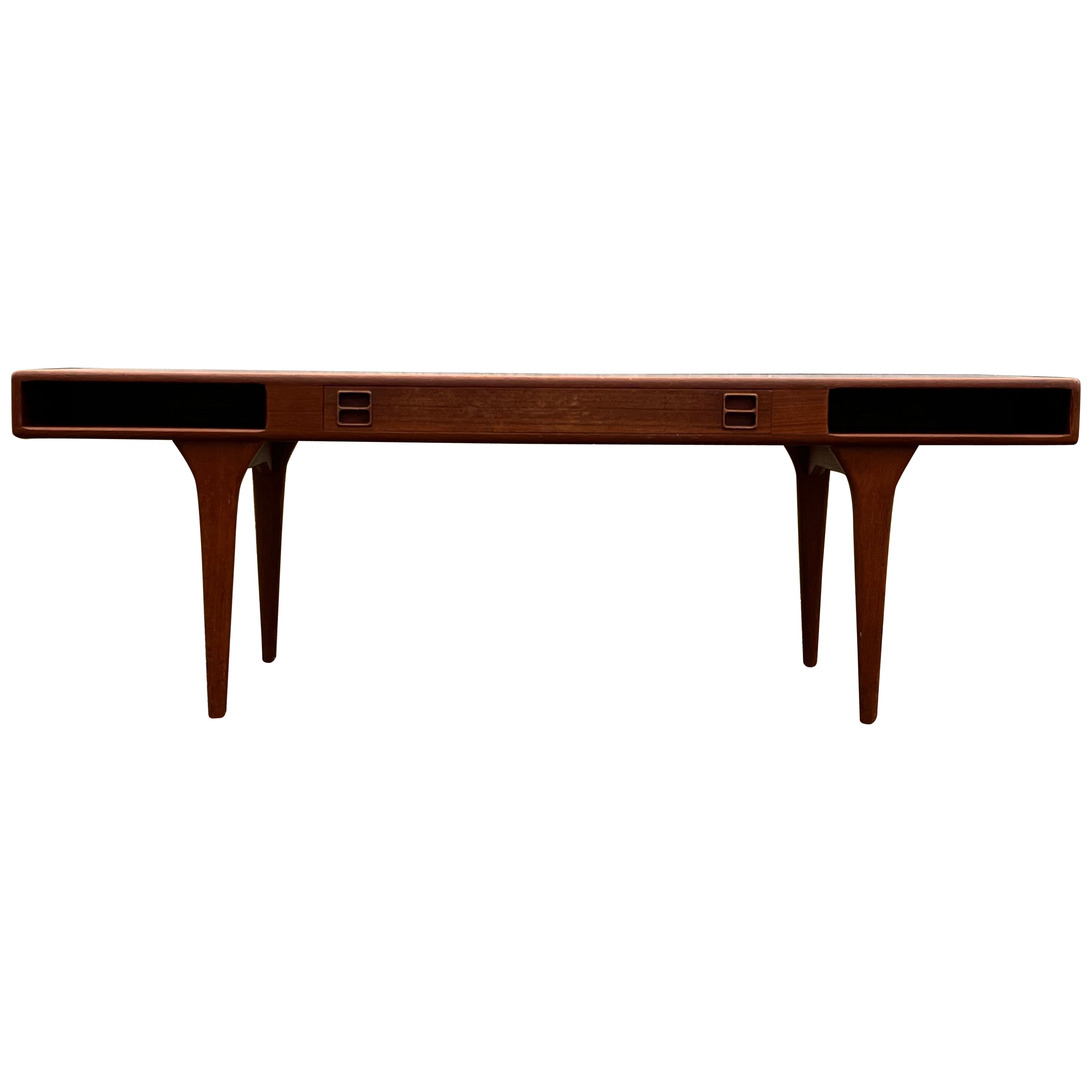 Teak coffee table by Danish architect Johannes Andersen. Made by Silkeborg : 286 For Sale