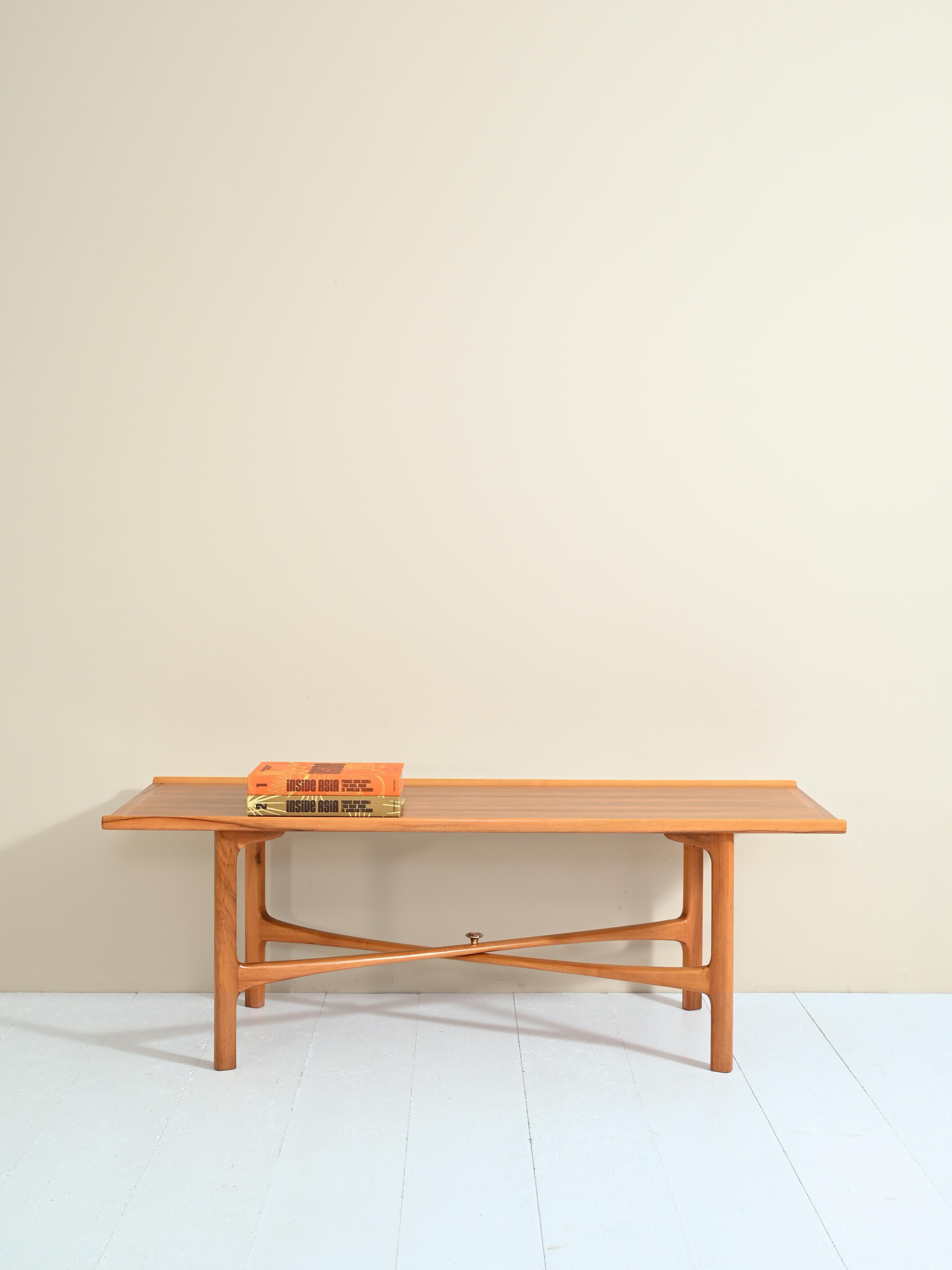 Coffee table designed by designer Folke Ohlsson for the Bodafors company in 1963.

The massive frame is made of teak wood and is in excellent condition.

Good condition, conservative restoration has been done with natural products. Please pay