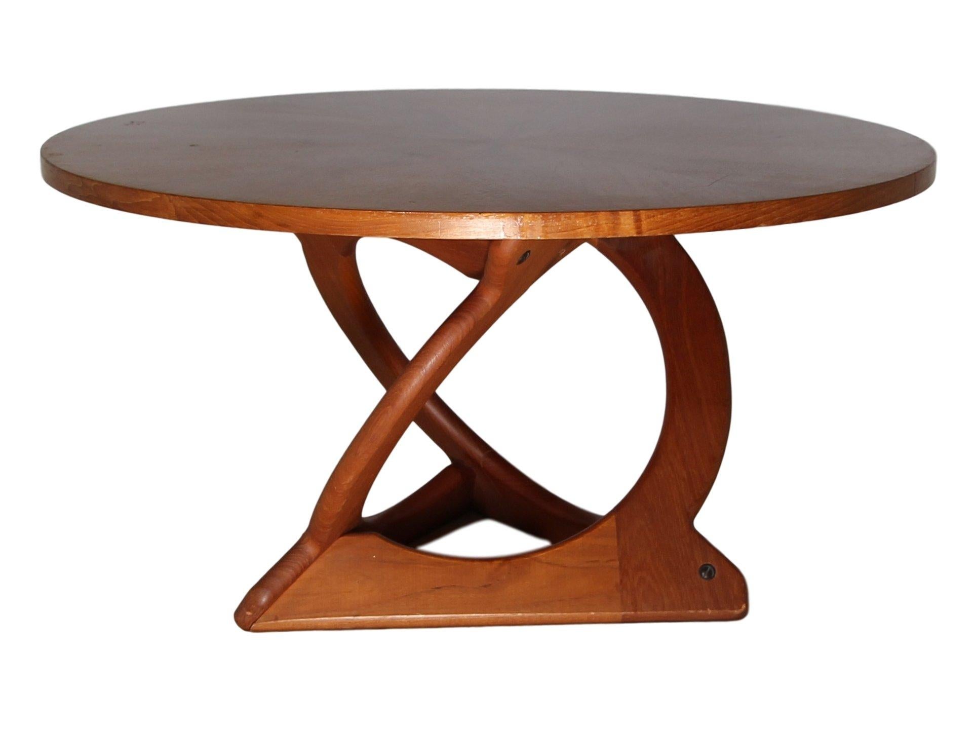 Midcentury teak coffee table. Designed by Danish designer Søren Georg Jensen and made by Kubus. Sculptural solid teak frame and teak veneered top with amazing starburst design. Wonderful table for any midcentury themed home, office or lobby.

Very