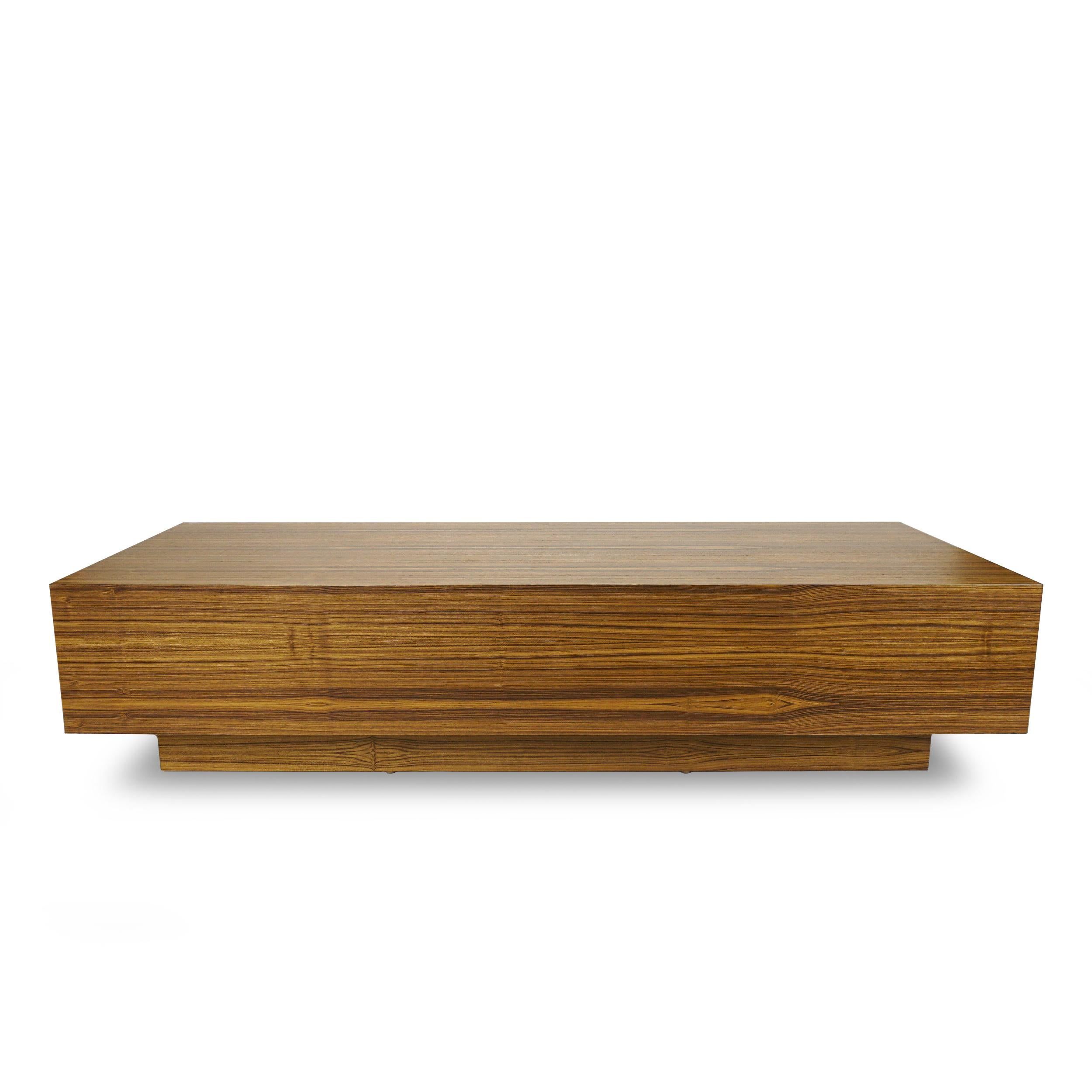 Sleek rectangular coffee table with tiger eye design teak veneer finish. Can be made in custom size. Ask for availability of piece as shown. 

Measurements:
Overall: 70”W x 30”D x 16”H

Price as shown: $3,880
Customization may change price.

How We