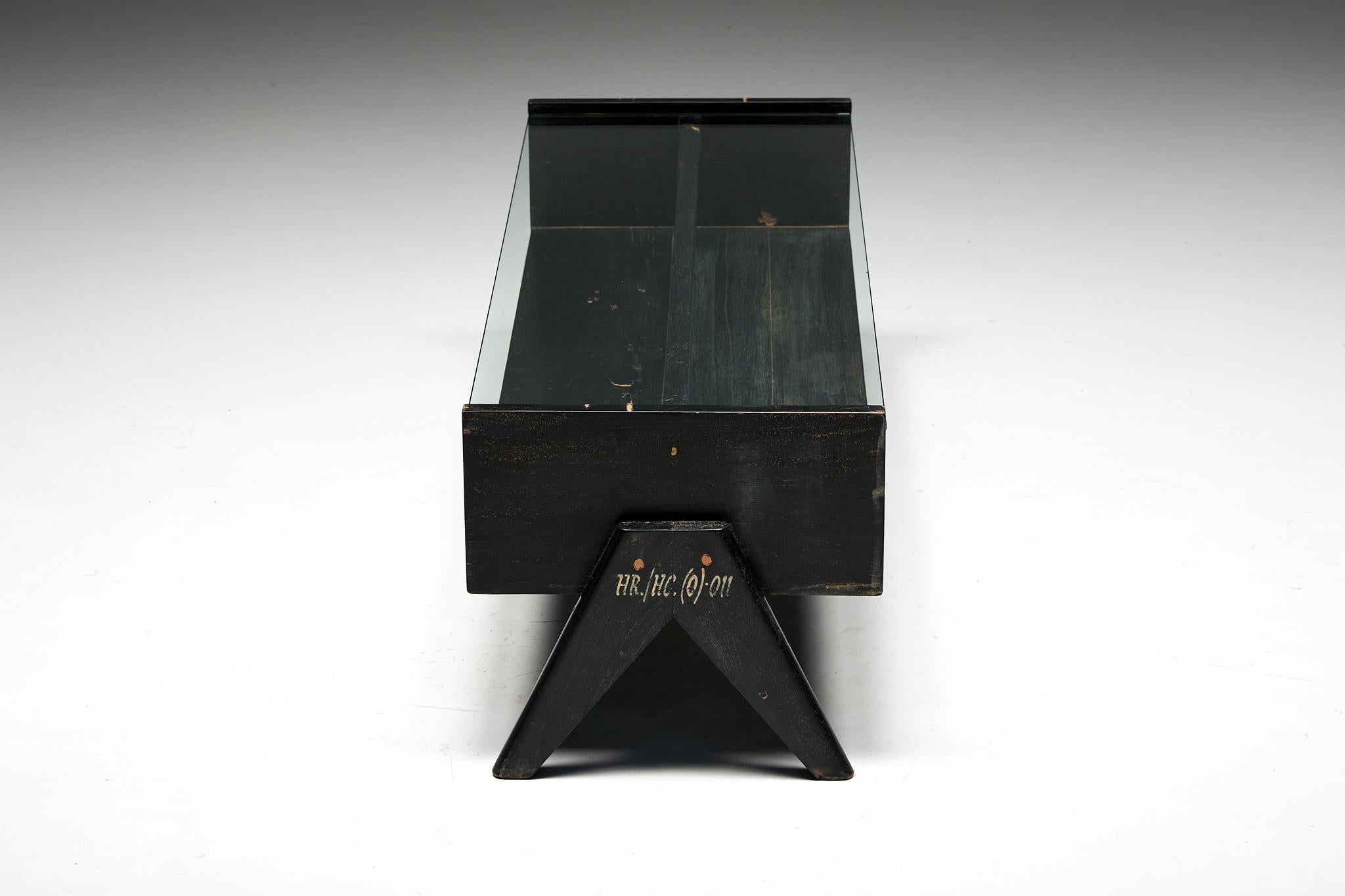 Pierre Jeanneret; India; Chandigarh; Teak; Coffee Table; Lounge Table; 1960s; PJ-TB-05-B; Le Corbusier;

Pierre Jeanneret rectangular PJ-TB-05-A coffee table from the 1960s, featuring black lacquered wood and a sleek glass tabletop. The glass