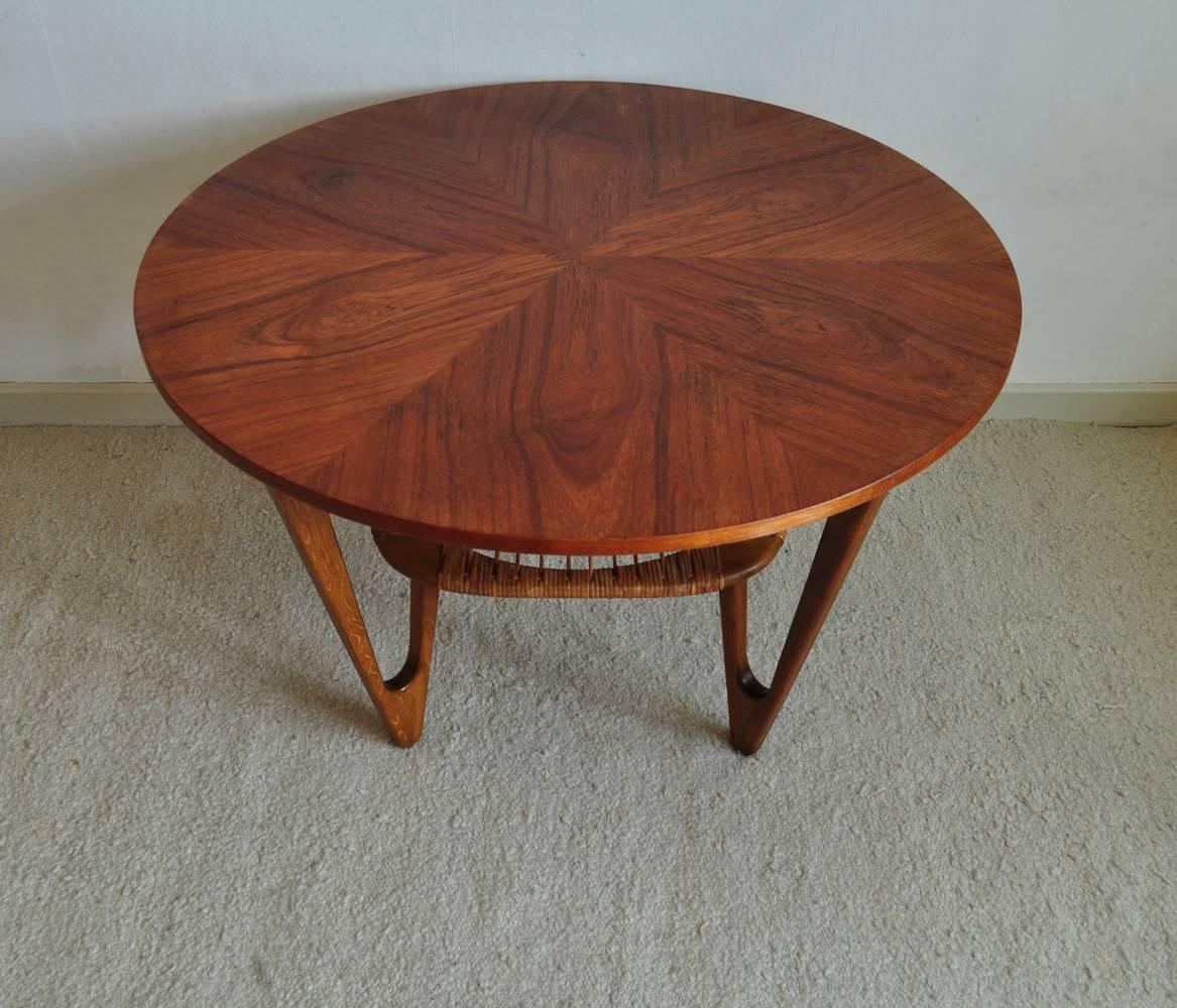 Scandinavian Modern Teak Coffee Table with caned Rack designed by Kurt Østervig