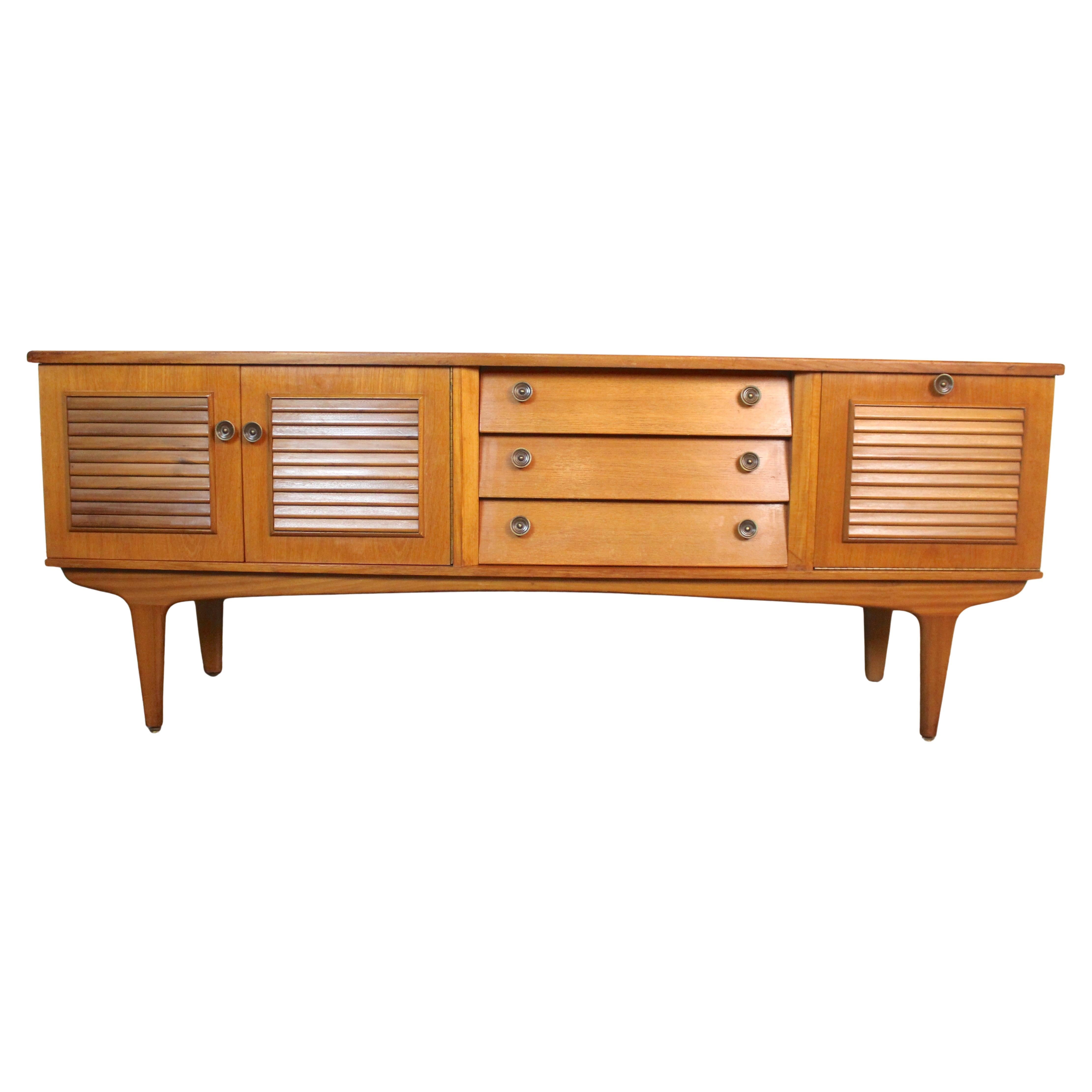 Credenza in teak con frontale a scomparsa in vendita