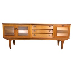 Credenza in teak con frontale a scomparsa