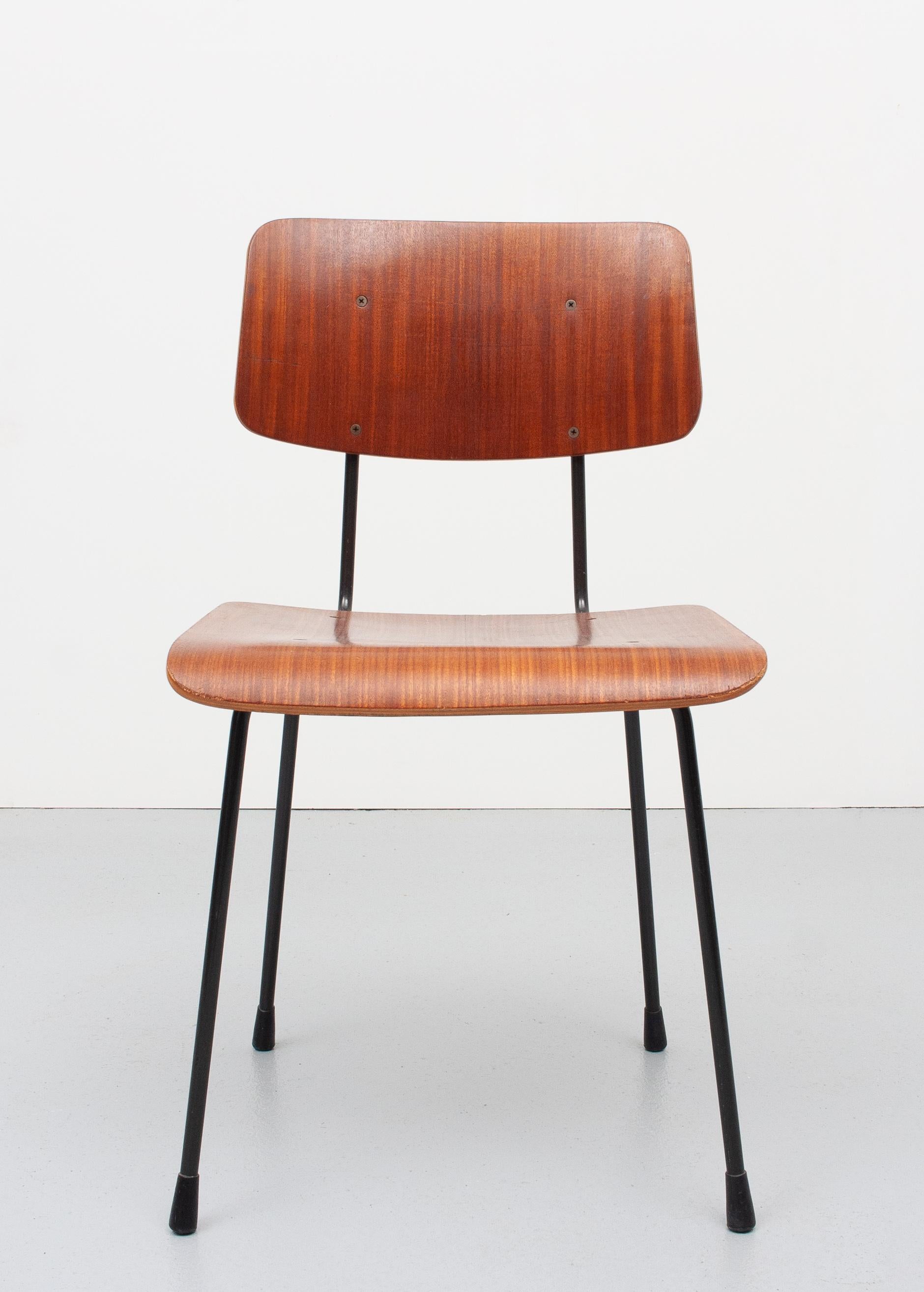 Very nice chair by AR Cordemijer for Gispen 'The frame forms a handle behind the backrest. This allowed the chair to be moved easily. The thin Black round steel of the frame gives the chair a sleek look. Teak plywood seat and back rest. Very good