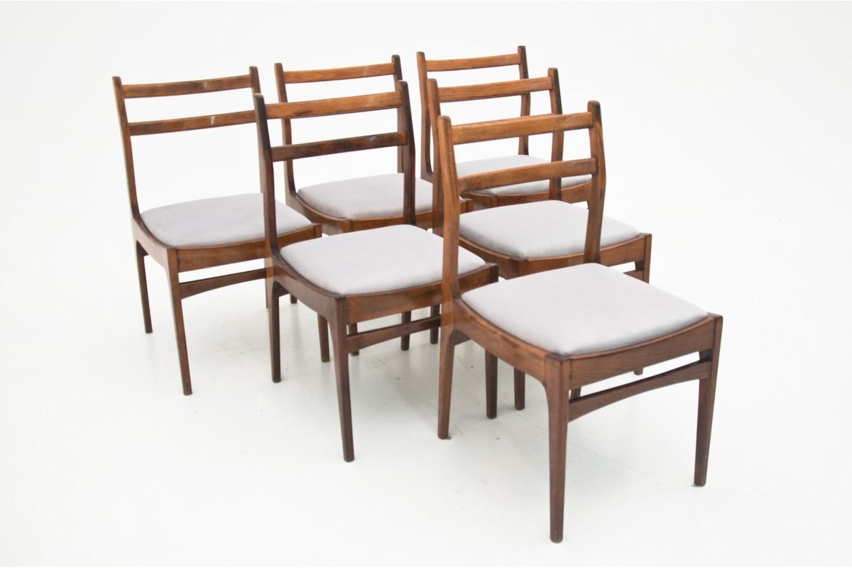 Four teak dining chairs with ladder back from Denmark, 1960s.
Grey upholstery.
Very good condition.
