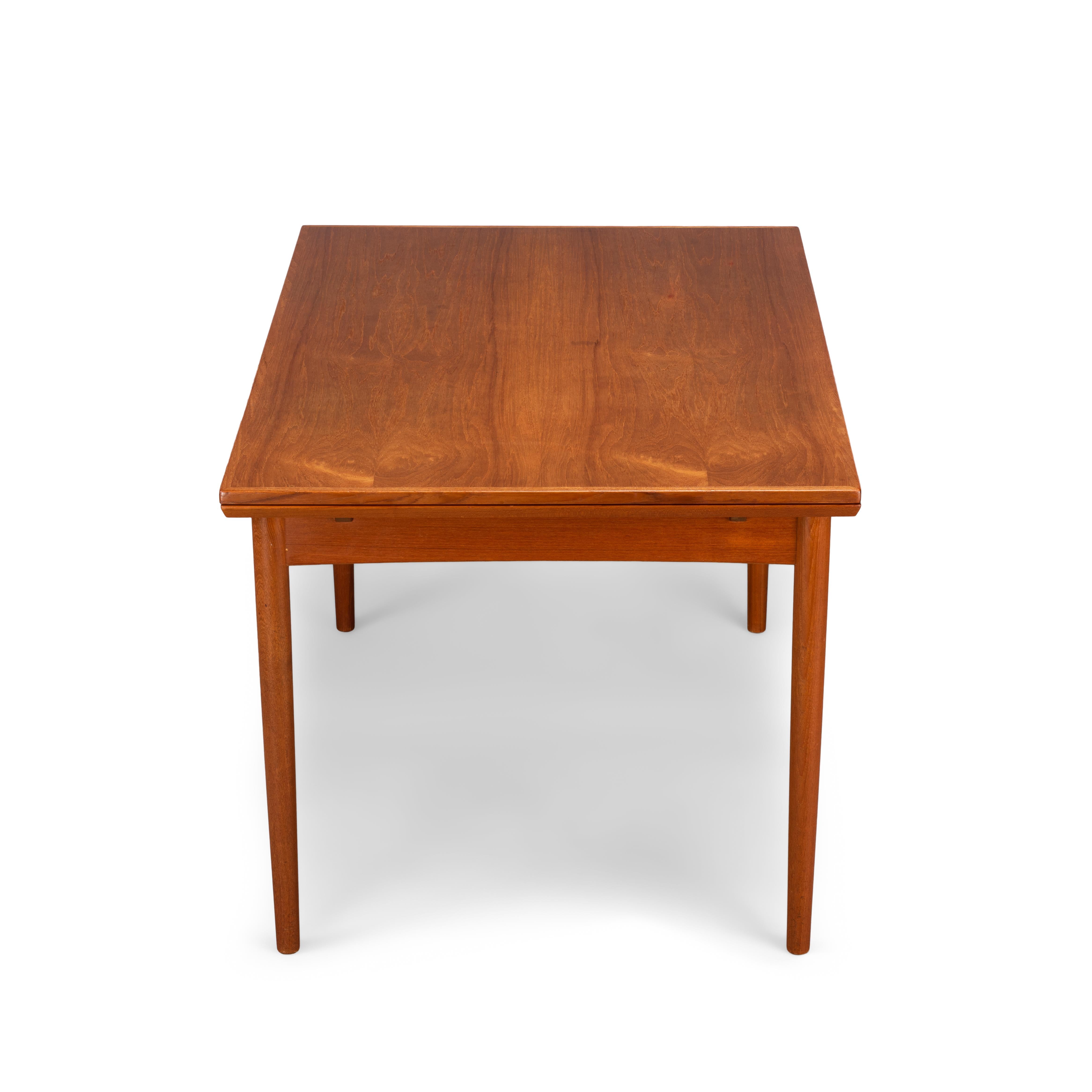 teak dining table extendable