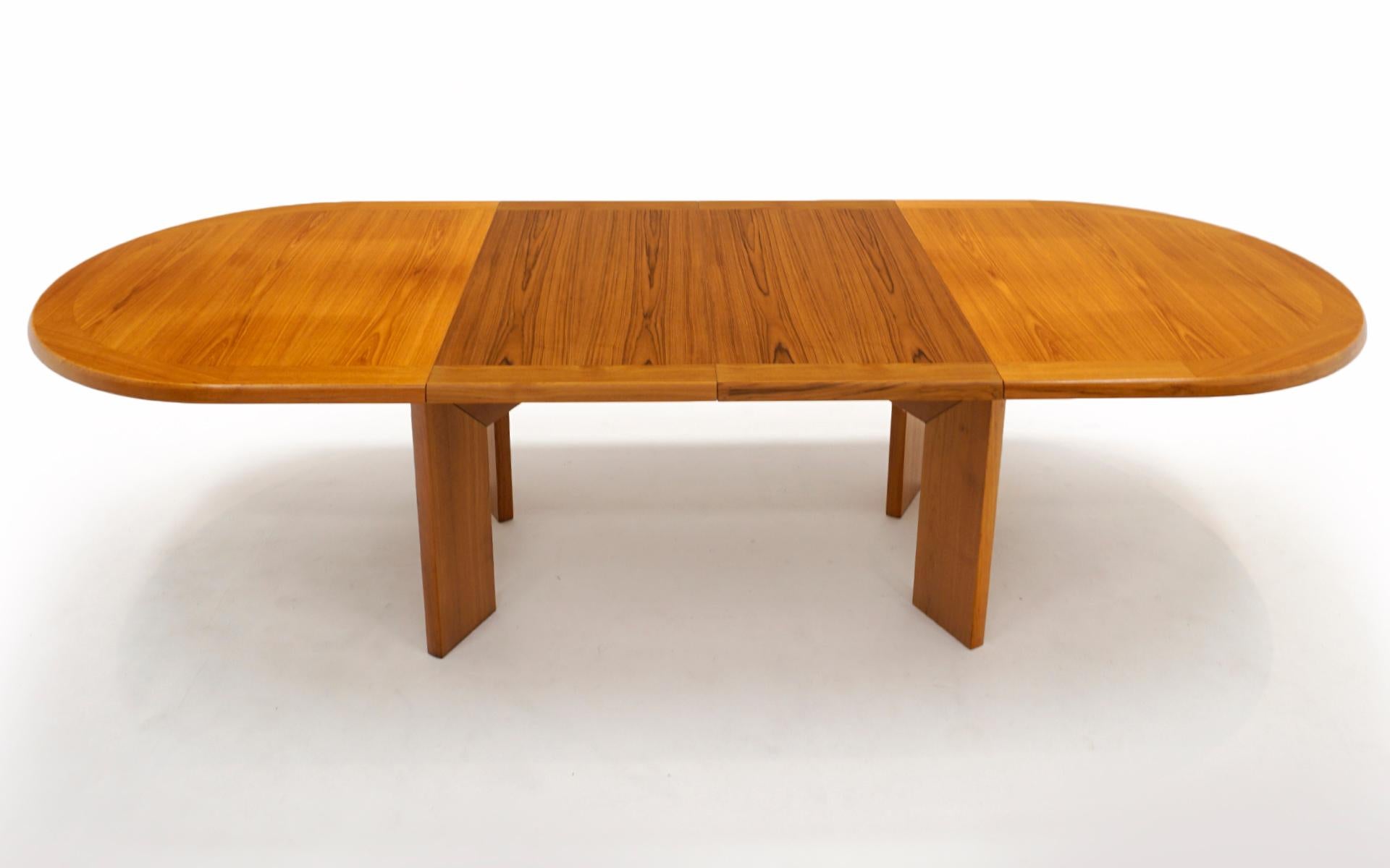 Teak Danish Modern Dining Table w/ Two Self Storing Leaves by Scovby 4