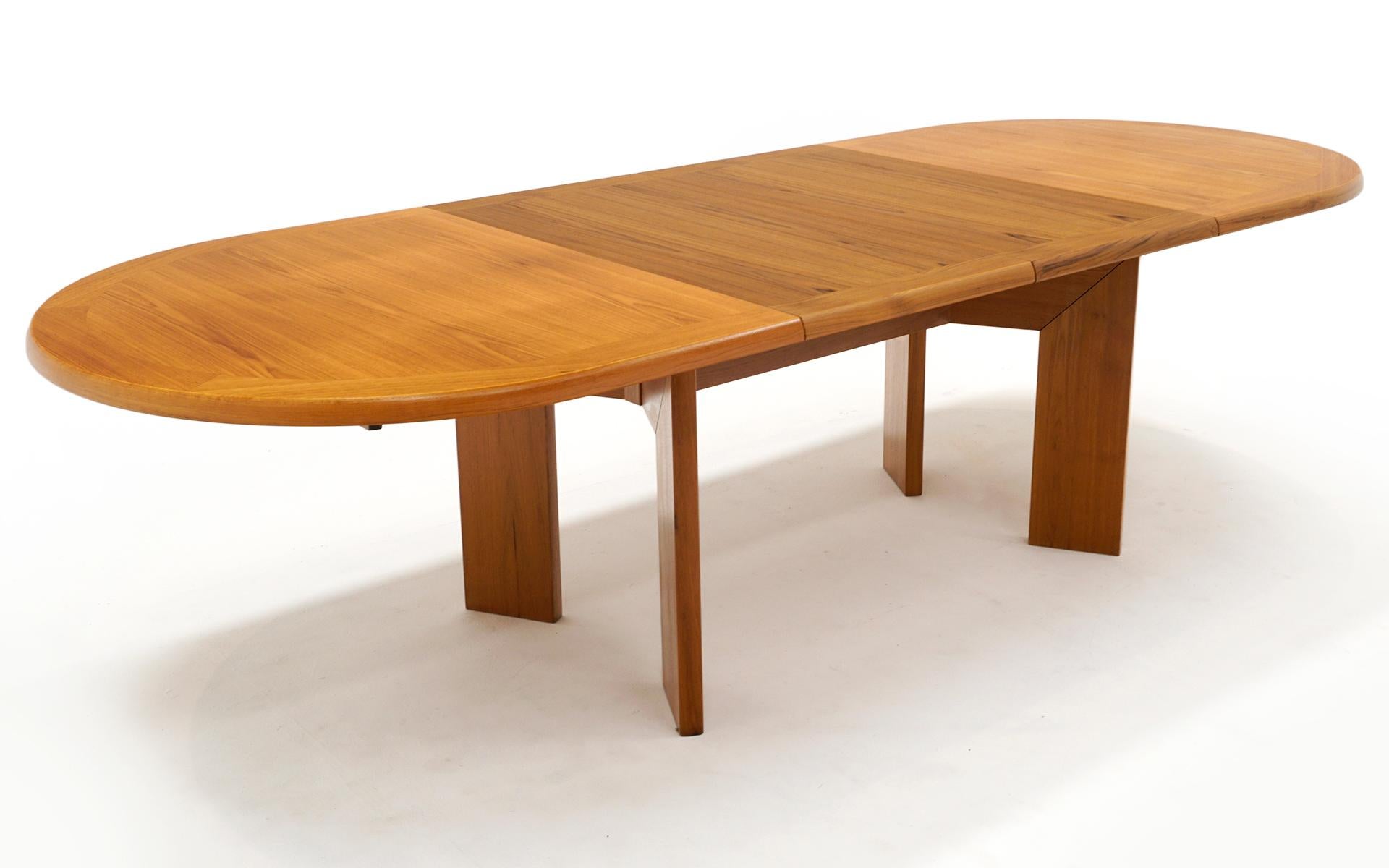 Teak Danish Modern Dining Table w/ Two Self Storing Leaves by Scovby 5