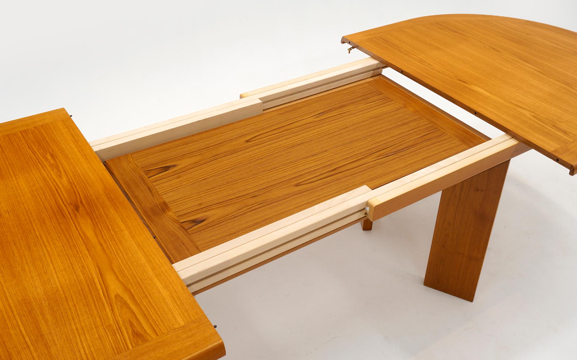 Teak Danish Modern Dining Table w/ Two Self Storing Leaves by Scovby 6