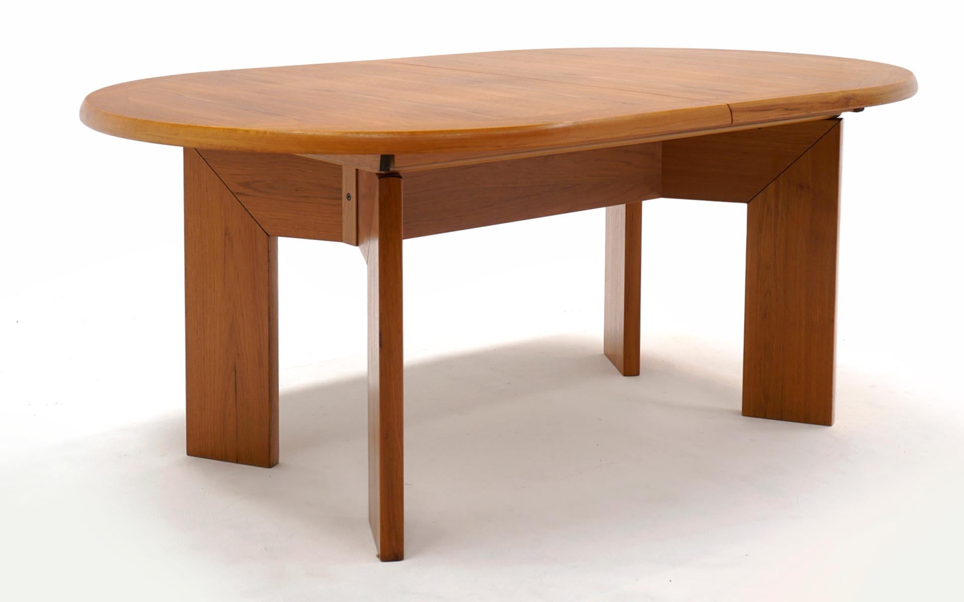 Scandinavian Modern Teak Danish Modern Dining Table w/ Two Self Storing Leaves by Scovby