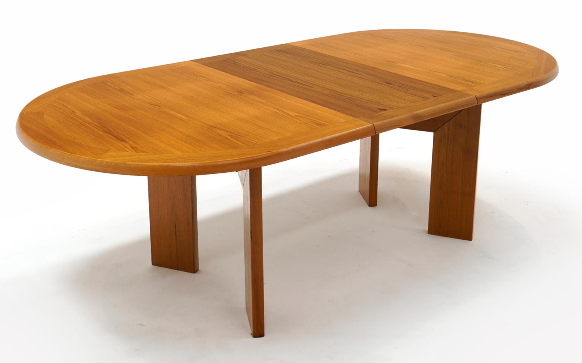 Teak Danish Modern Dining Table w/ Two Self Storing Leaves by Scovby 1