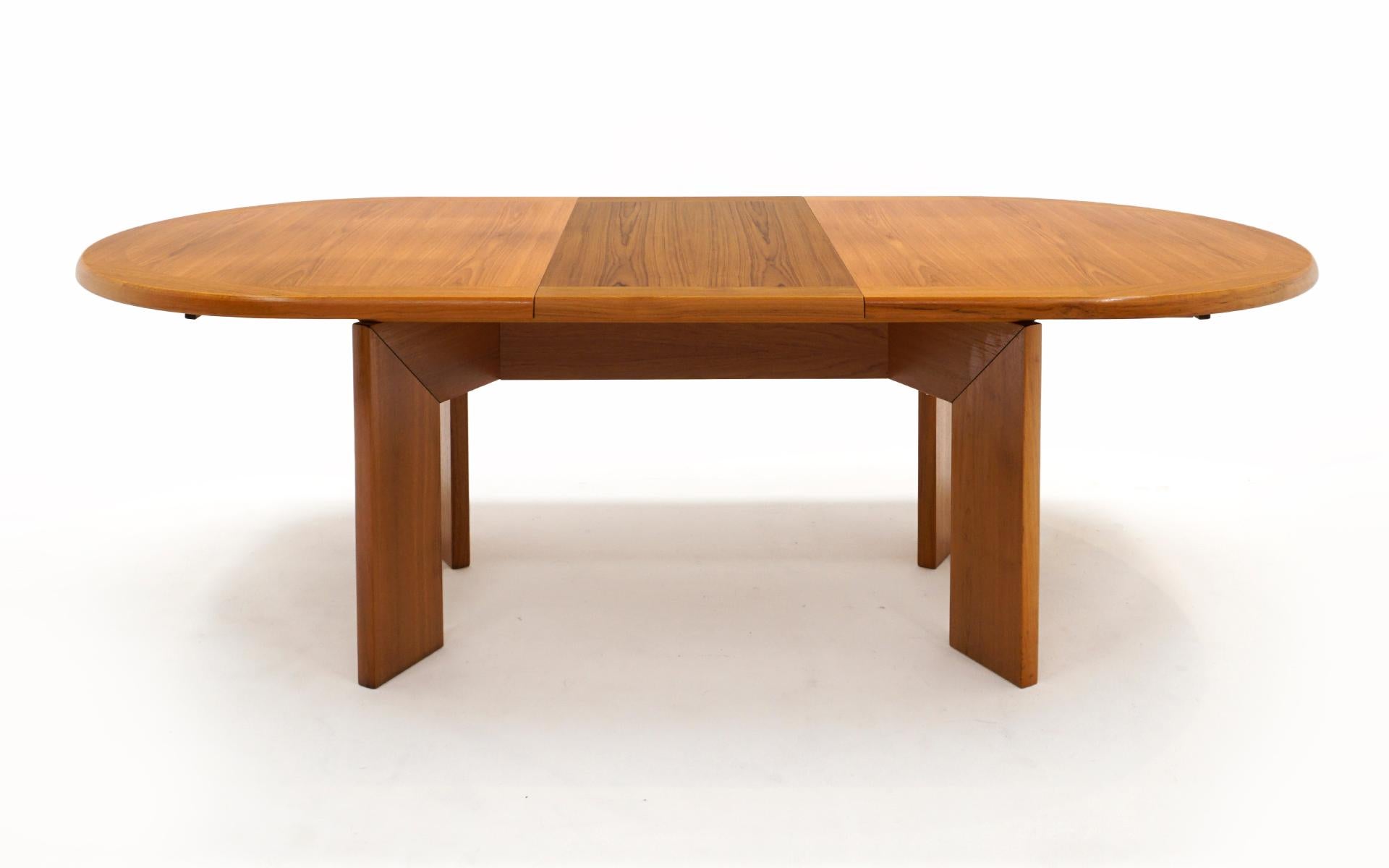 Teak Danish Modern Dining Table w/ Two Self Storing Leaves by Scovby 2