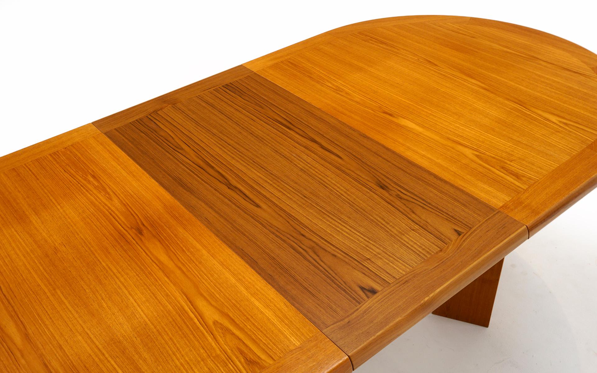 Teak Danish Modern Dining Table w/ Two Self Storing Leaves by Scovby 3