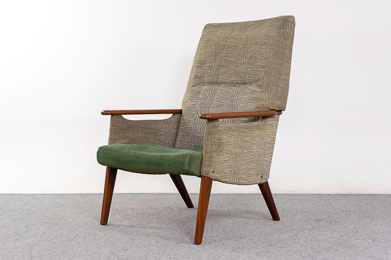 Teak Danish lounge chair 1960's. Elegant lines with floating solid wood armrests and sleek legs. Original upholstery with significant wear, foam requires immediate replacement.

Unrestored item with option to purchase in restored condition for an