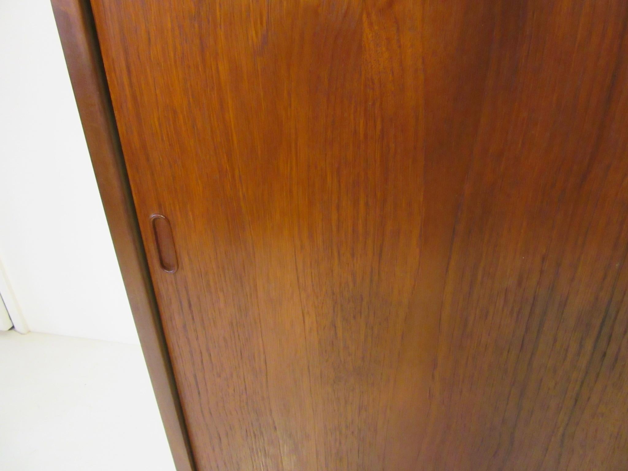 Teak Danish Wardrobe or Armoire in the style of Arne Vodder In Good Condition In Cincinnati, OH