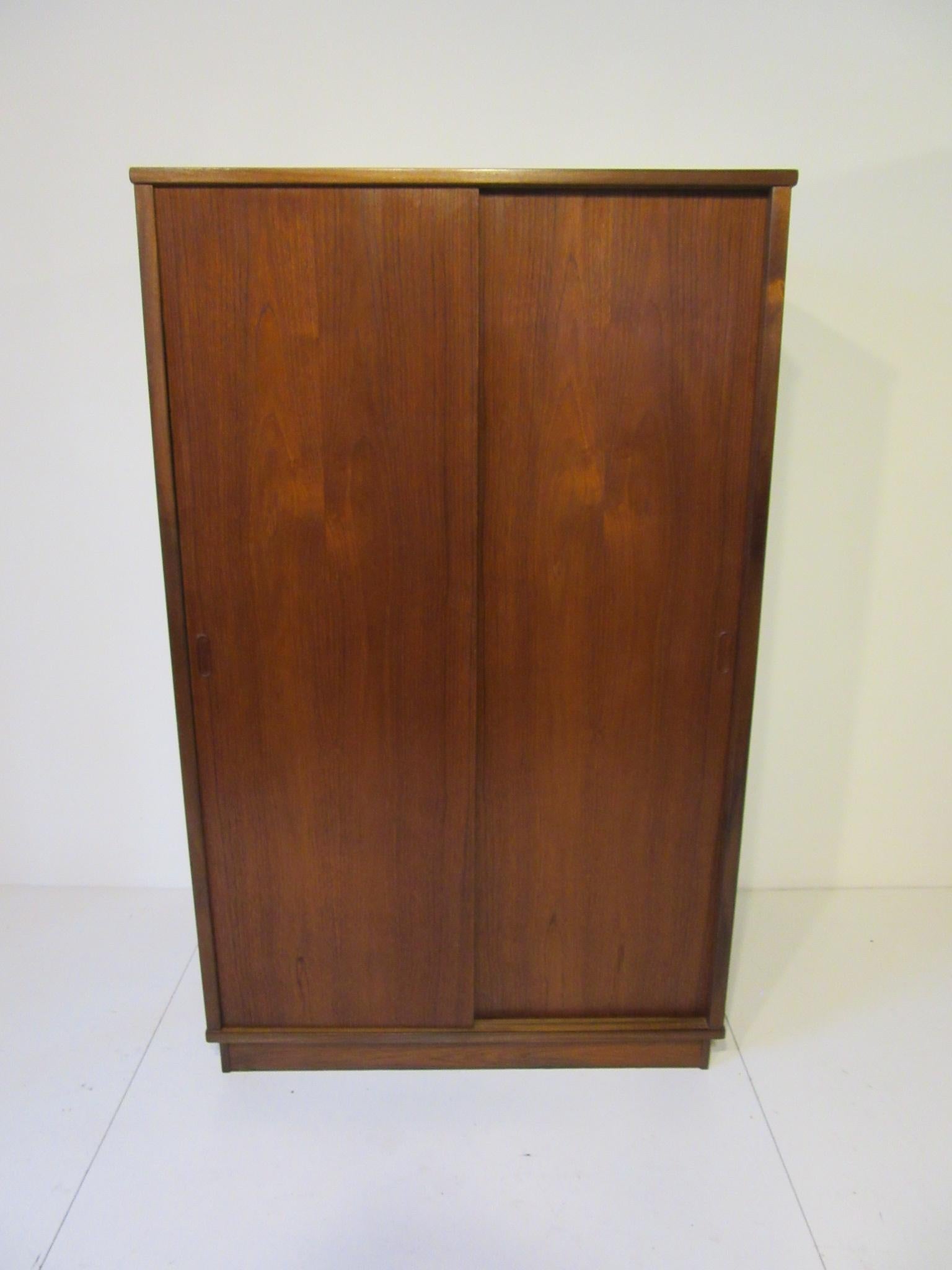 Teak Danish Wardrobe or Armoire in the style of Arne Vodder 1