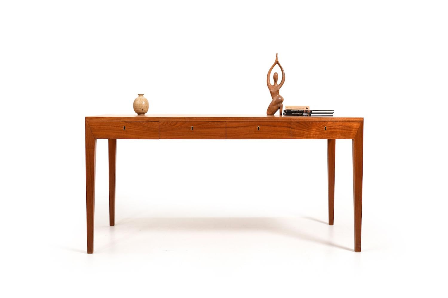 Freestanding teak desk, mod. 36 by Severin Hansen Jr. for Haslev Møbelsnedkeri Denmark 1950s. Elegant shape with four drawers in front. Beautiful selected teak.