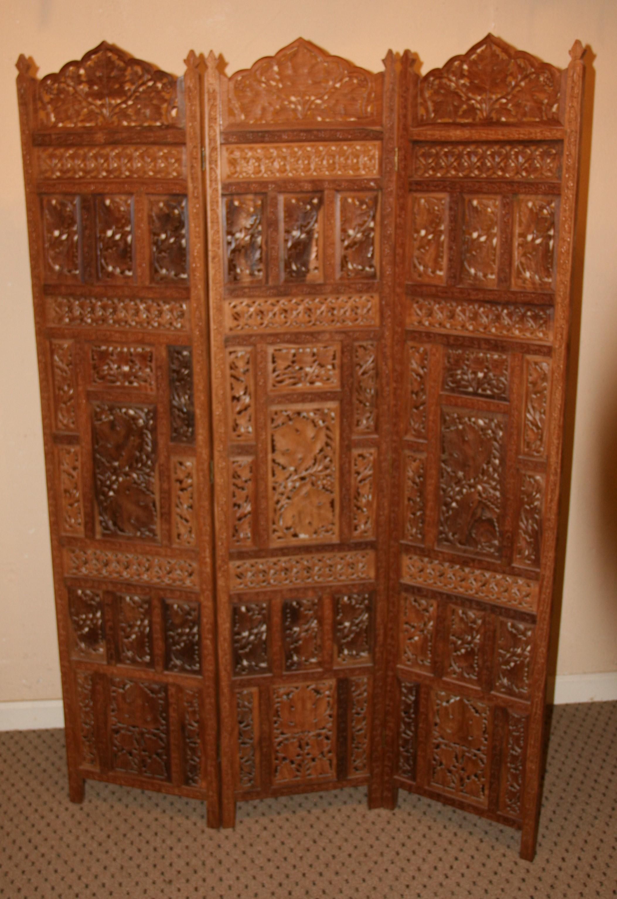 3-987 Detailed carved teak room divider screen.