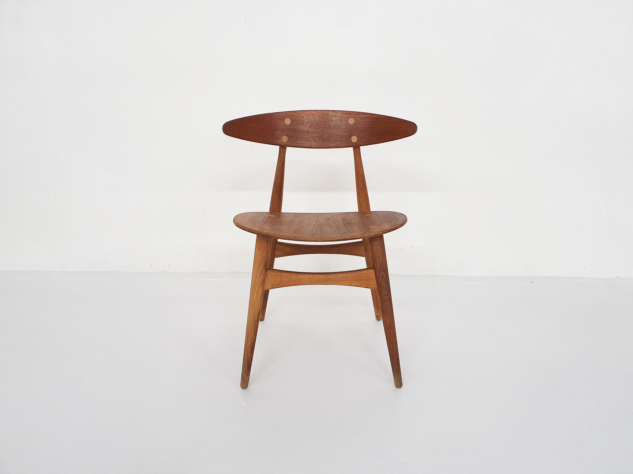 Vintage edition CH33T teak dining chair by Hans Wegner for Carl Hansen and Son.