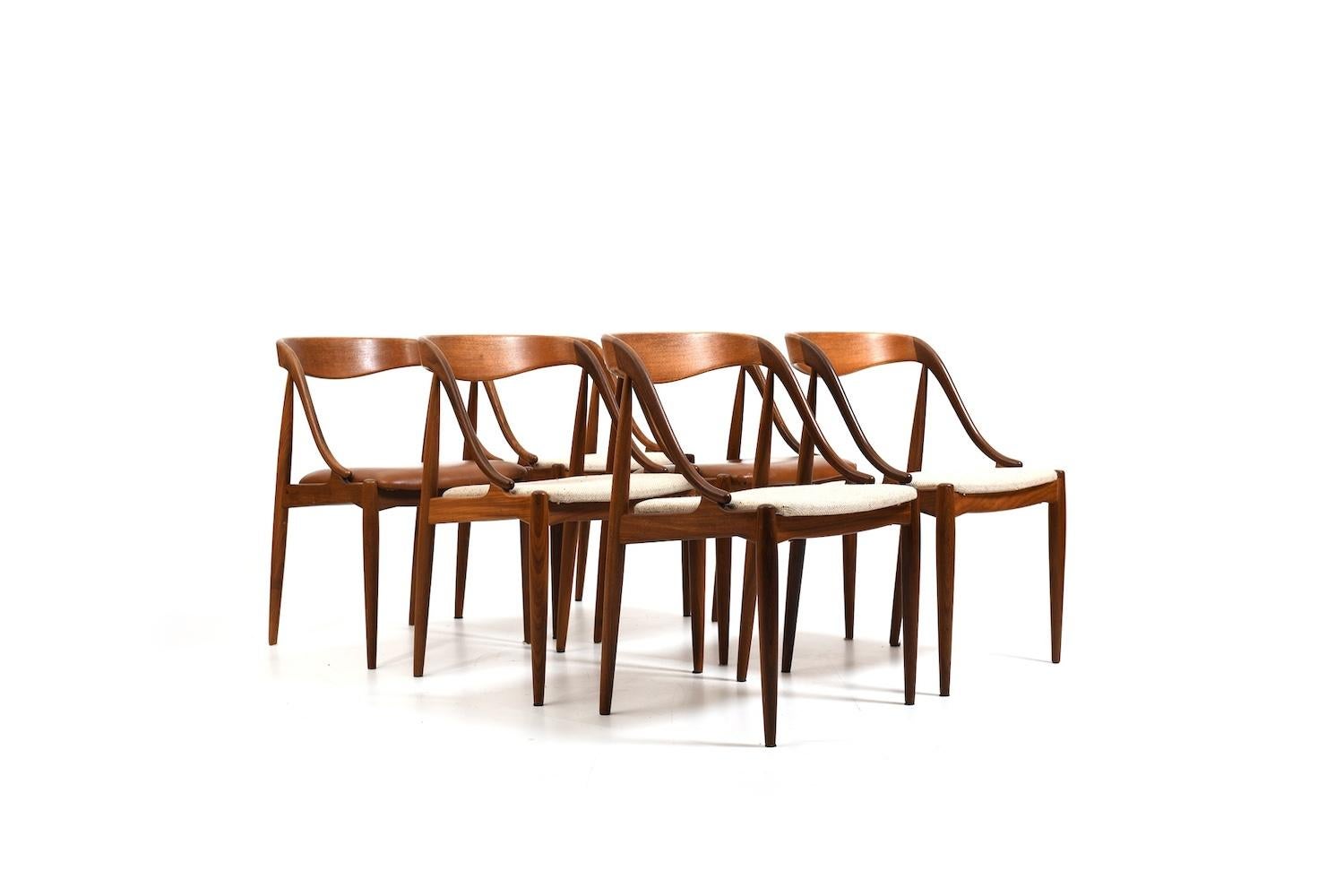 Set of six danish dining chairs in teak. Design by Johannes Andersen for Uldum Møbelfabrik 1950s. Model no.16. Upholstered in creme fabric. 2 chairs later with brown imitation leather. We can set new fabric for you, please ask the price!  Price for