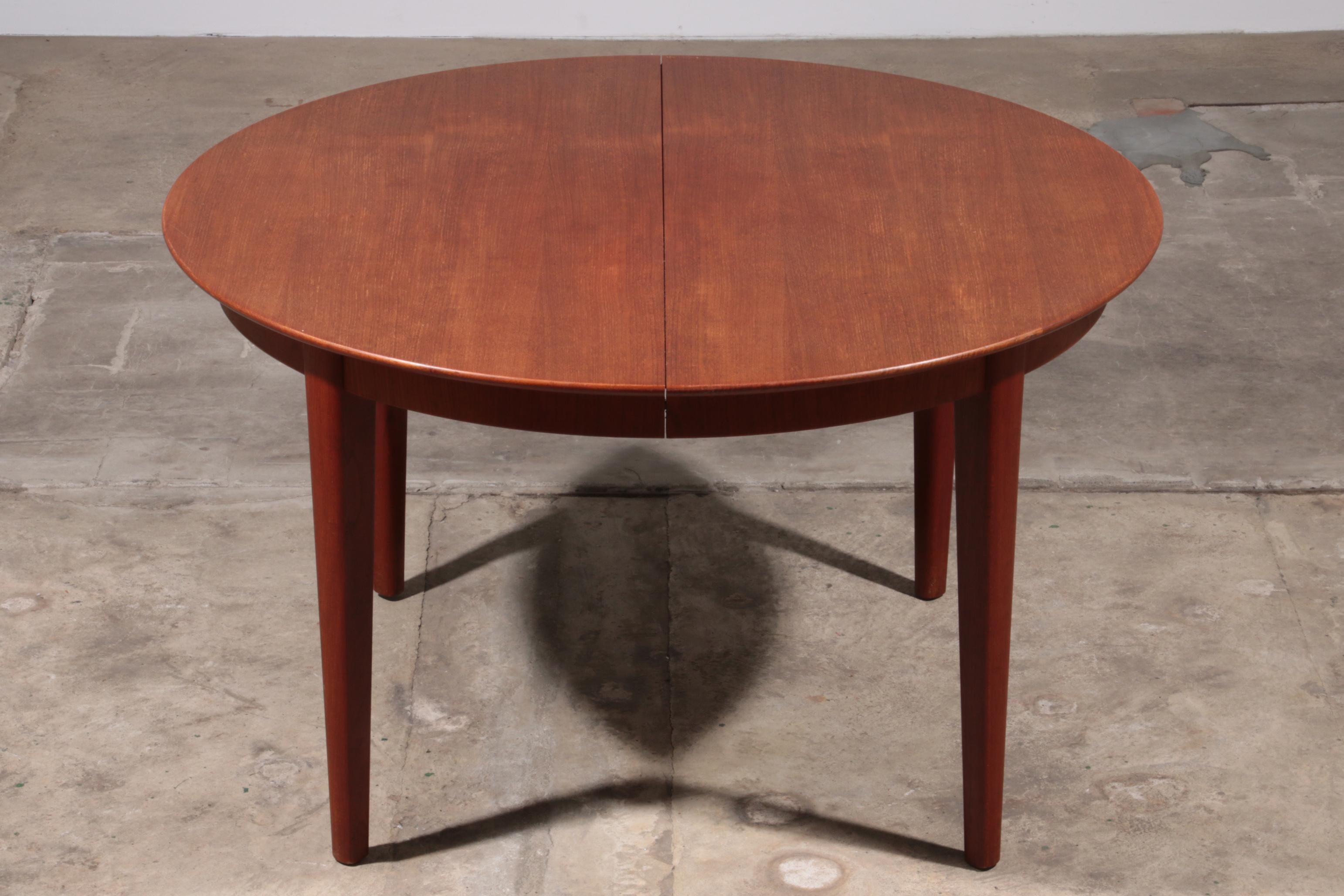 Mid-Century Modern Teak Dining Table from the 1960s by Henning Kjærnulf Model 62 For Sale