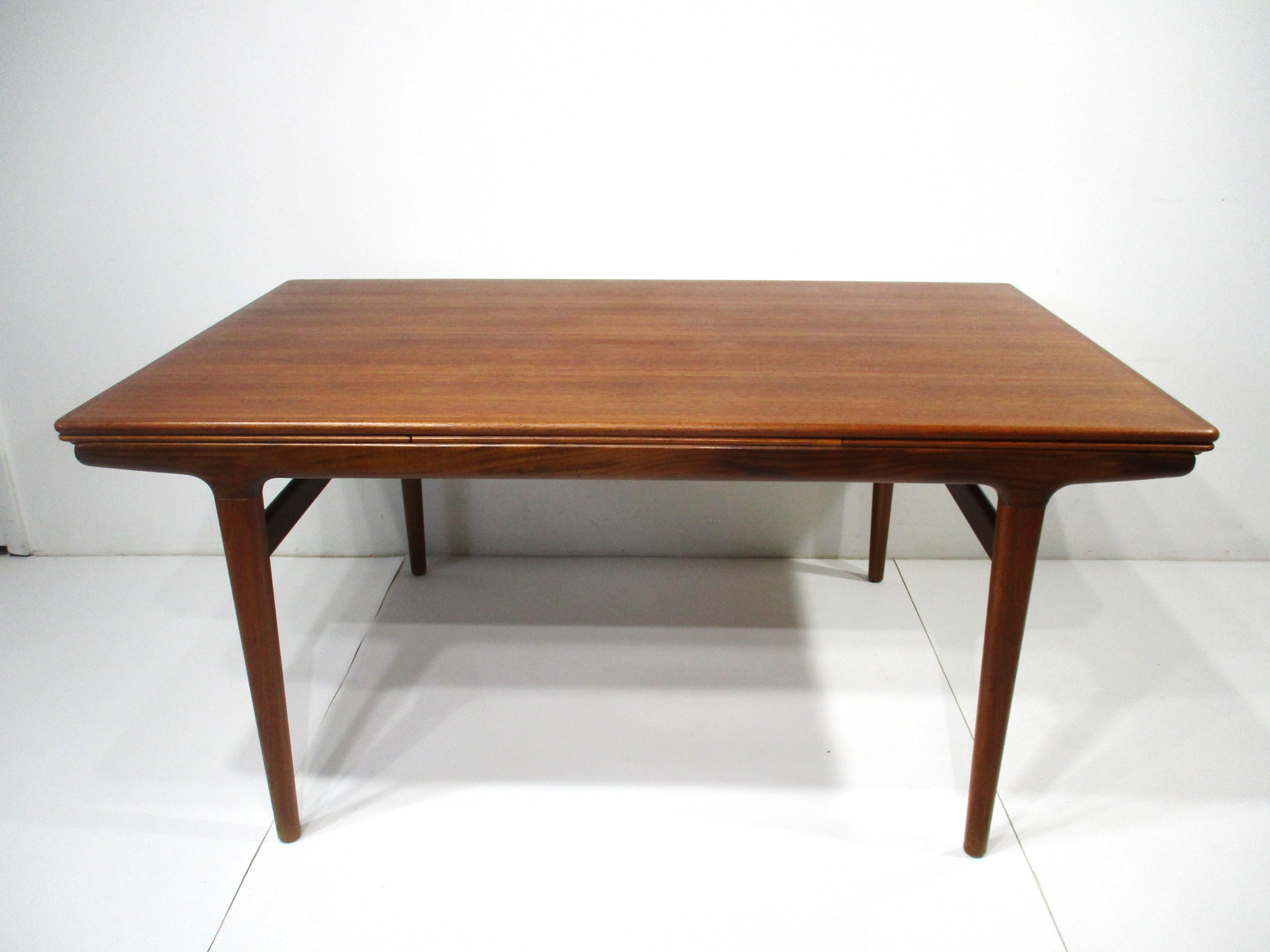 Teak Dining Table w/ Pullout Expandable Leaves by Niels Moller Denmark  For Sale 5